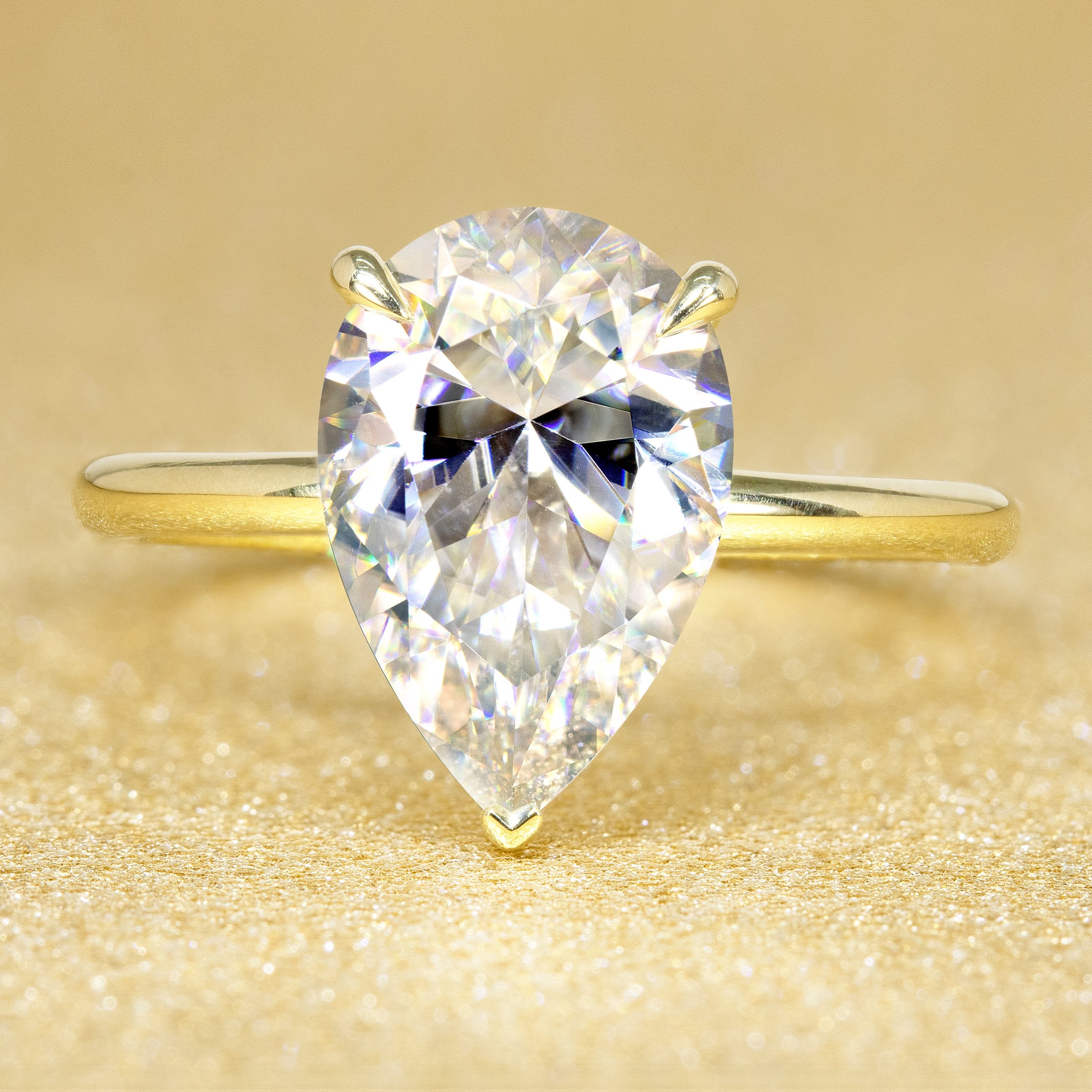 classic and timeless solitaire diamond and moissanite engagement ring.