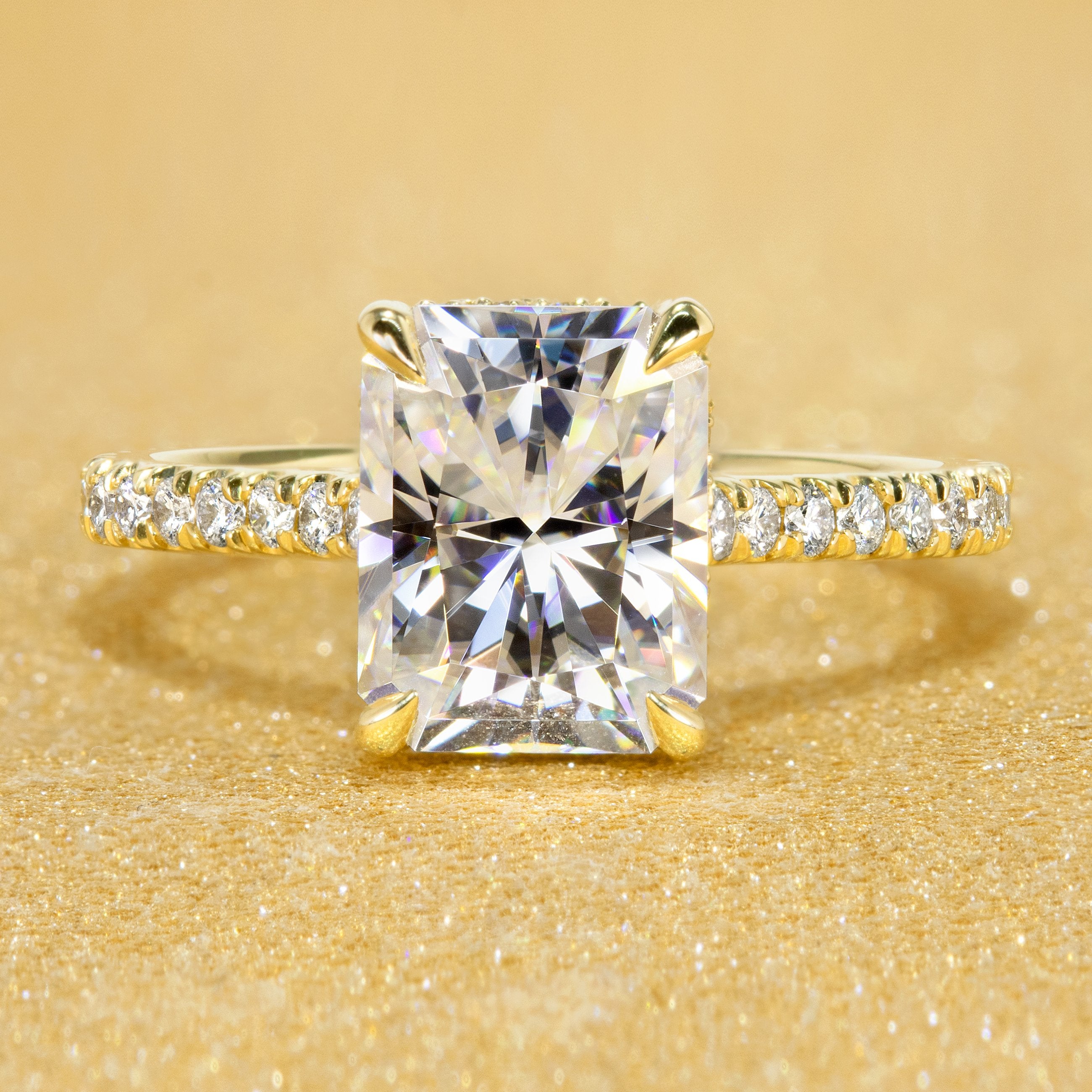 classic and timeless cathedral diamond and moissanite engagement ring.
