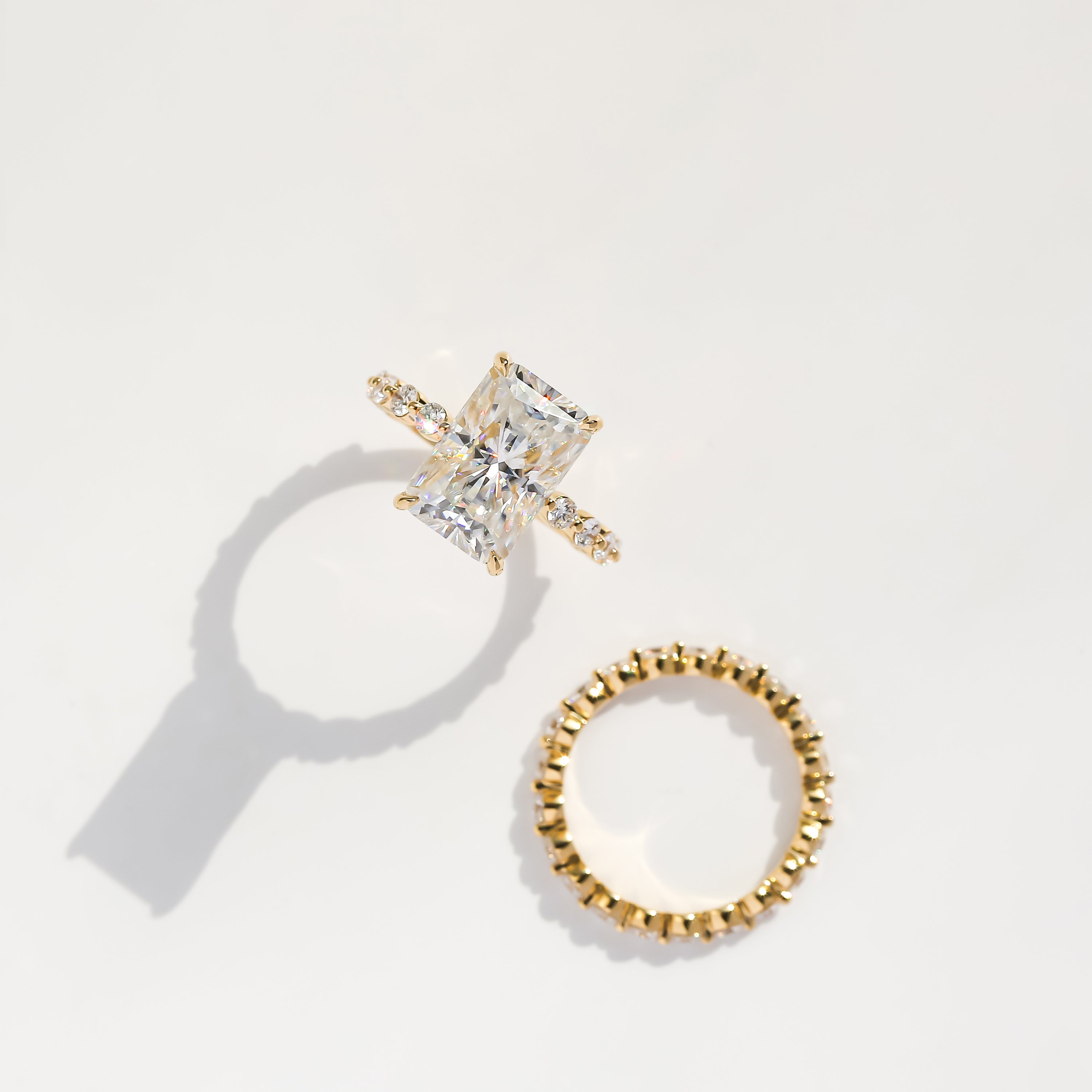 Classic Luna 4.5ct Elongated Radiant-cut Moissanite Hidden Halo Floating Lab-grown Diamond Engagement ring in 14K Gold, 18K Gold, or Platinum handcrafted in Los Angeles by Earthena Jewelry.