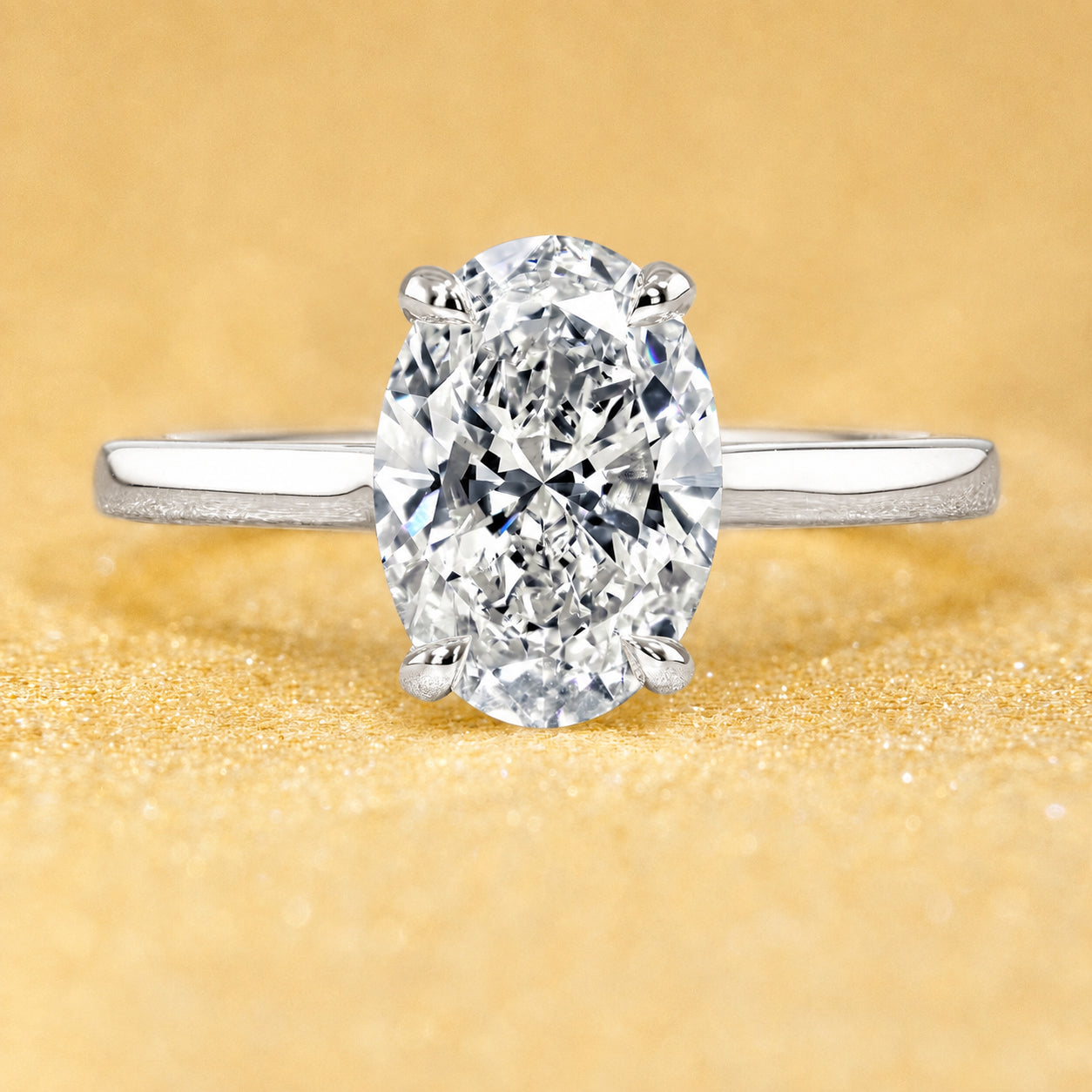 The Sofia, 2ct Elongated Oval-Cut Lab-Grown Diamond Cathedral Engagement Ring with Diamond Bridge in 14K Gold, 18K Gold, or Platinum by Earthena Jewelry of Beverly Hills.