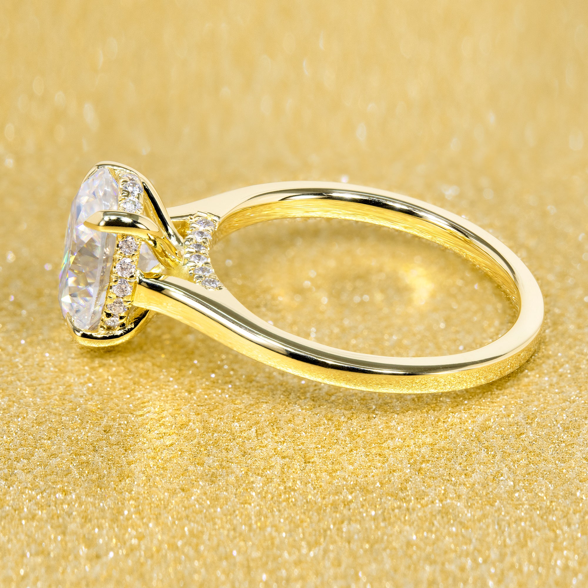 The Sofia, 2ct Elongated Oval-Cut Lab-Grown Diamond Cathedral Engagement Ring with Diamond Bridge in 14K Gold, 18K Gold, or Platinum by Earthena Jewelry of Beverly Hills.