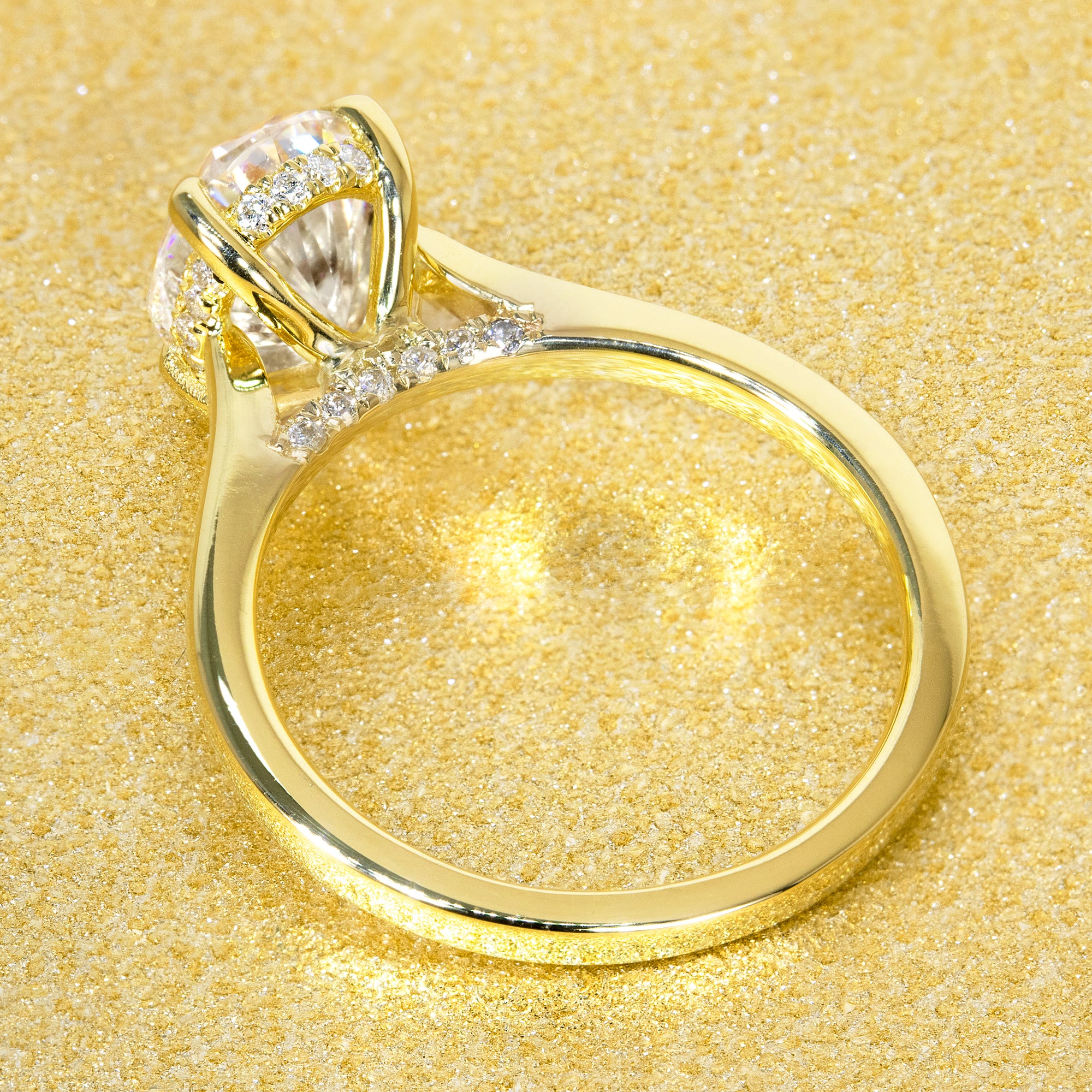 The Sofia, 2ct Elongated Oval-Cut Lab-Grown Diamond Cathedral Engagement Ring with Diamond Bridge in 14K Gold, 18K Gold, or Platinum by Earthena Jewelry of Beverly Hills.