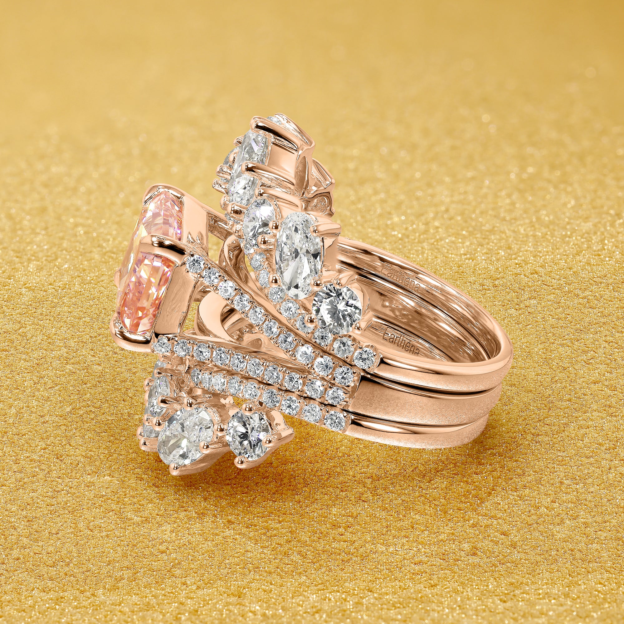 The Elara 3.12ct Elongated Radiant-Cut Pink Lab-Grown Diamond and Alessia Trio Set Handcrafted in 14K Gold, 18K Gold, or Platinum by Earthena Jewelry of Beverly Hills.