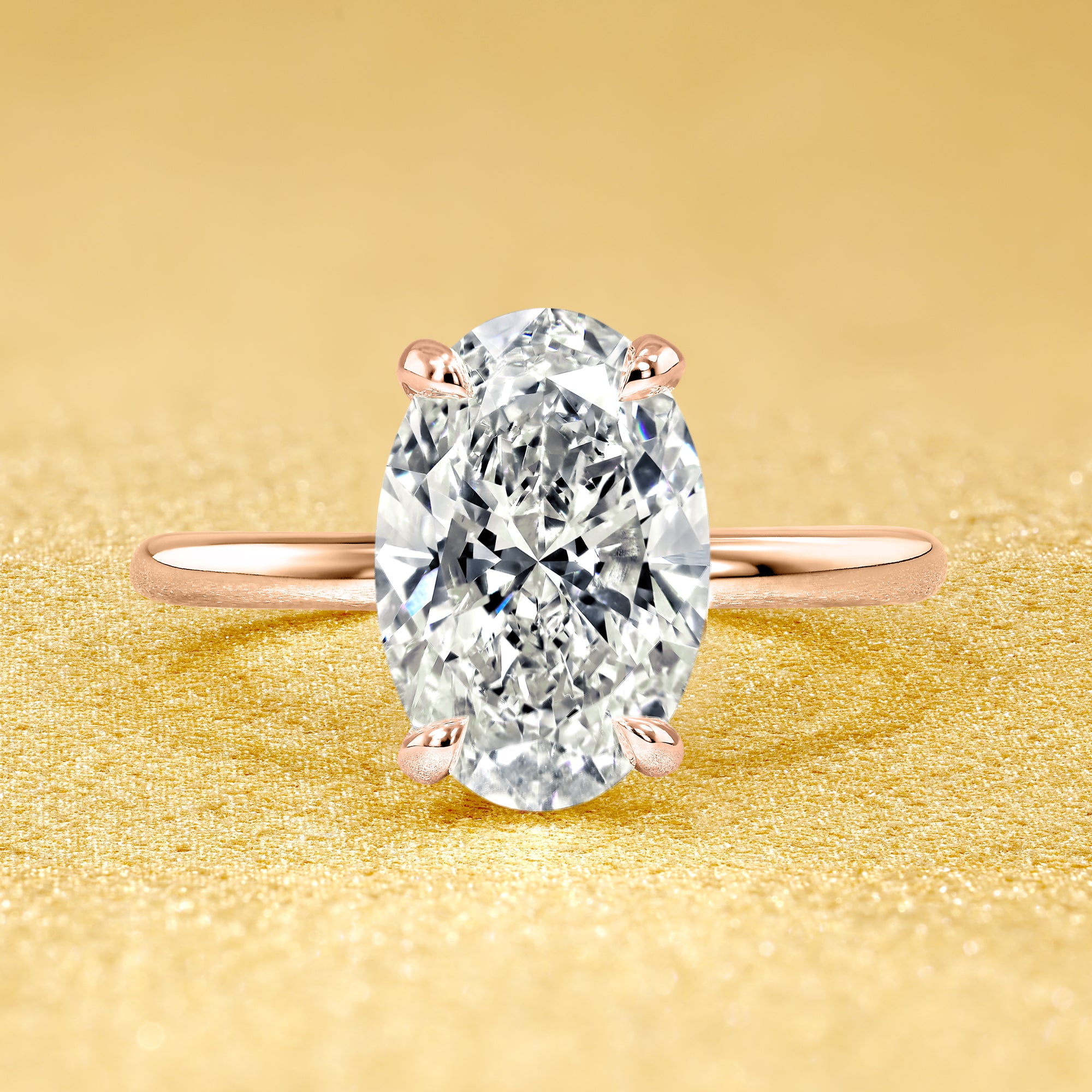 The Adara, 2ct Elongated Oval-Cut Lab-Grown Diamond Hidden Halo Engagement Ring in 14K Gold, 18K Gold, or Platinum by Earthena Jewelry of Beverly Hills.