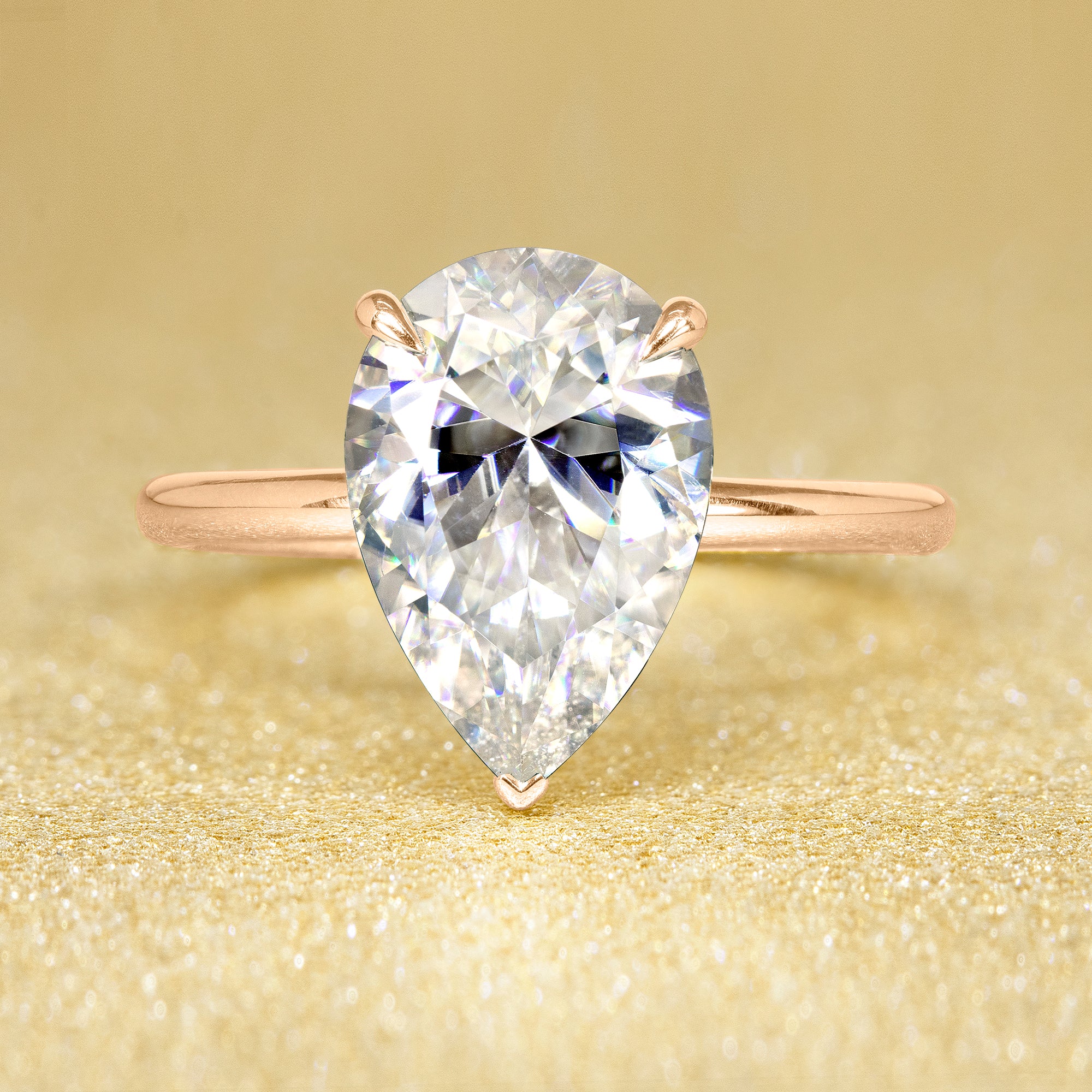 The Adara, 3ct Elongated Pear-Cut Lab-Grown Diamond Hidden Halo Engagement Ring in 14K Gold, 18K Gold, or Platinum by Earthena Jewelry of Beverly Hills.