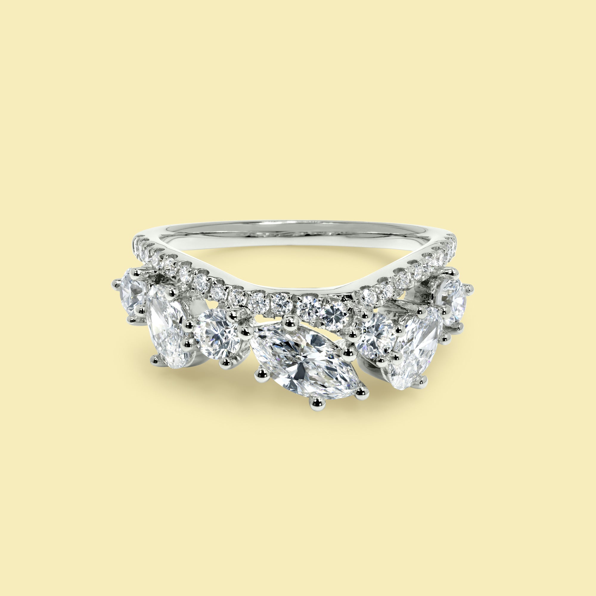 The Alessia, Double-Row Multi-Stone Curved Diamond Band Handcrafted in 14K Gold, 18K Gold, or Platinum by Earthena Jewelry of Beverly Hills.