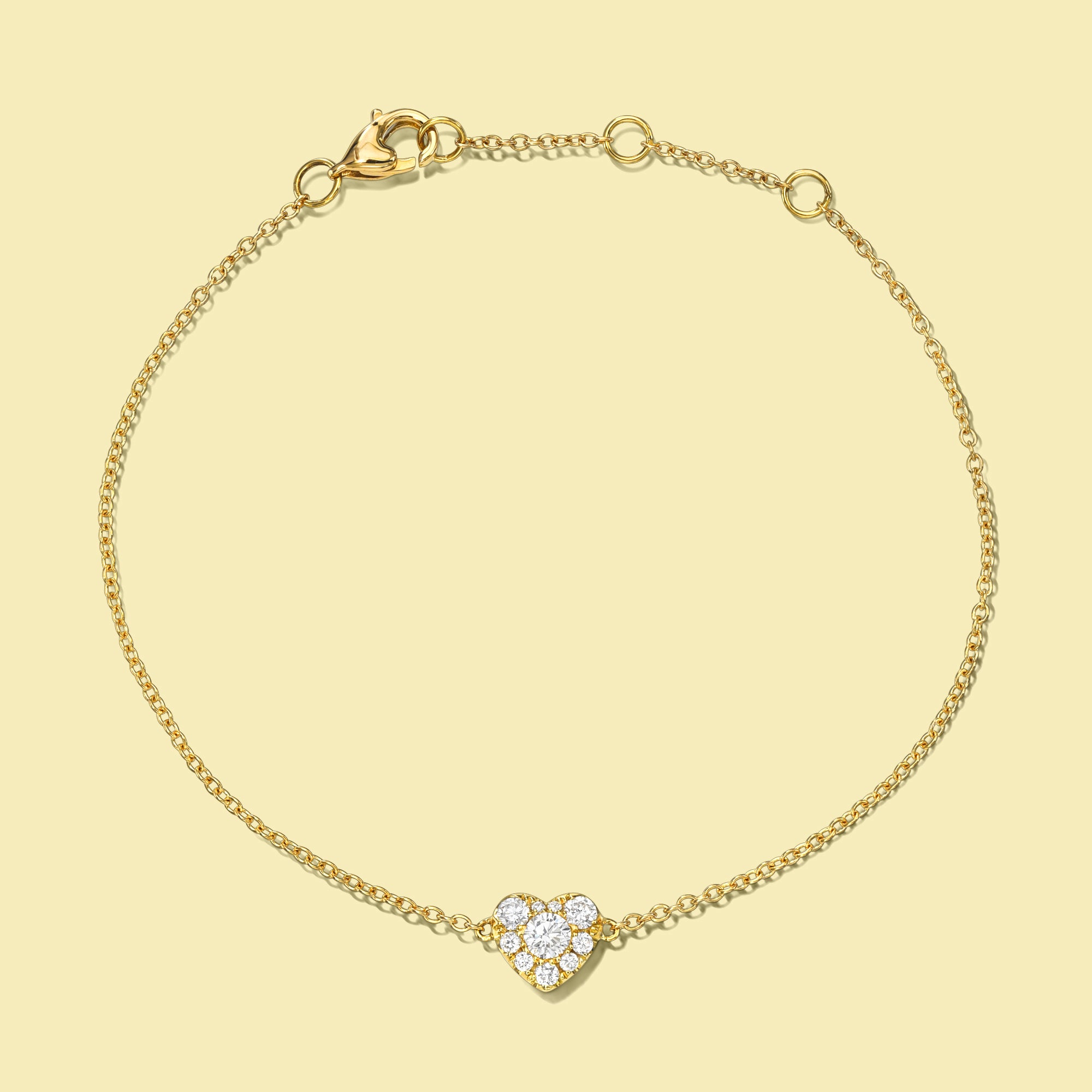 The Alia, Cluster Heart Shaped Diamond Adjustable Stackable Bracelet in 14K Gold, 18K Gold or Platinum by Earthena Jewelry of Beverly Hills, California.