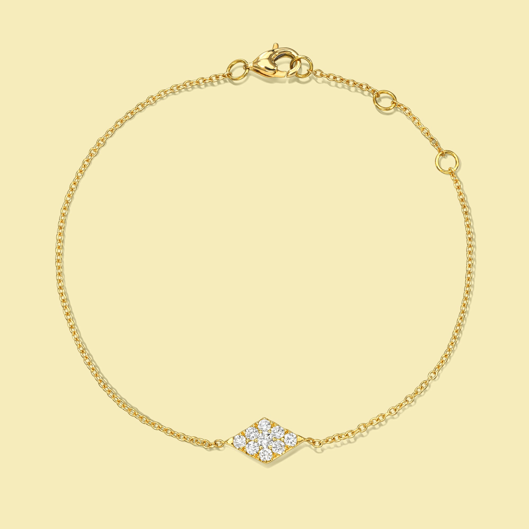 The Alia, Cluster Kite Shaped Diamond Adjustable Stackable Bracelet in 14K Gold, 18K Gold or Platinum by Earthena Jewelry of Beverly Hills, California.