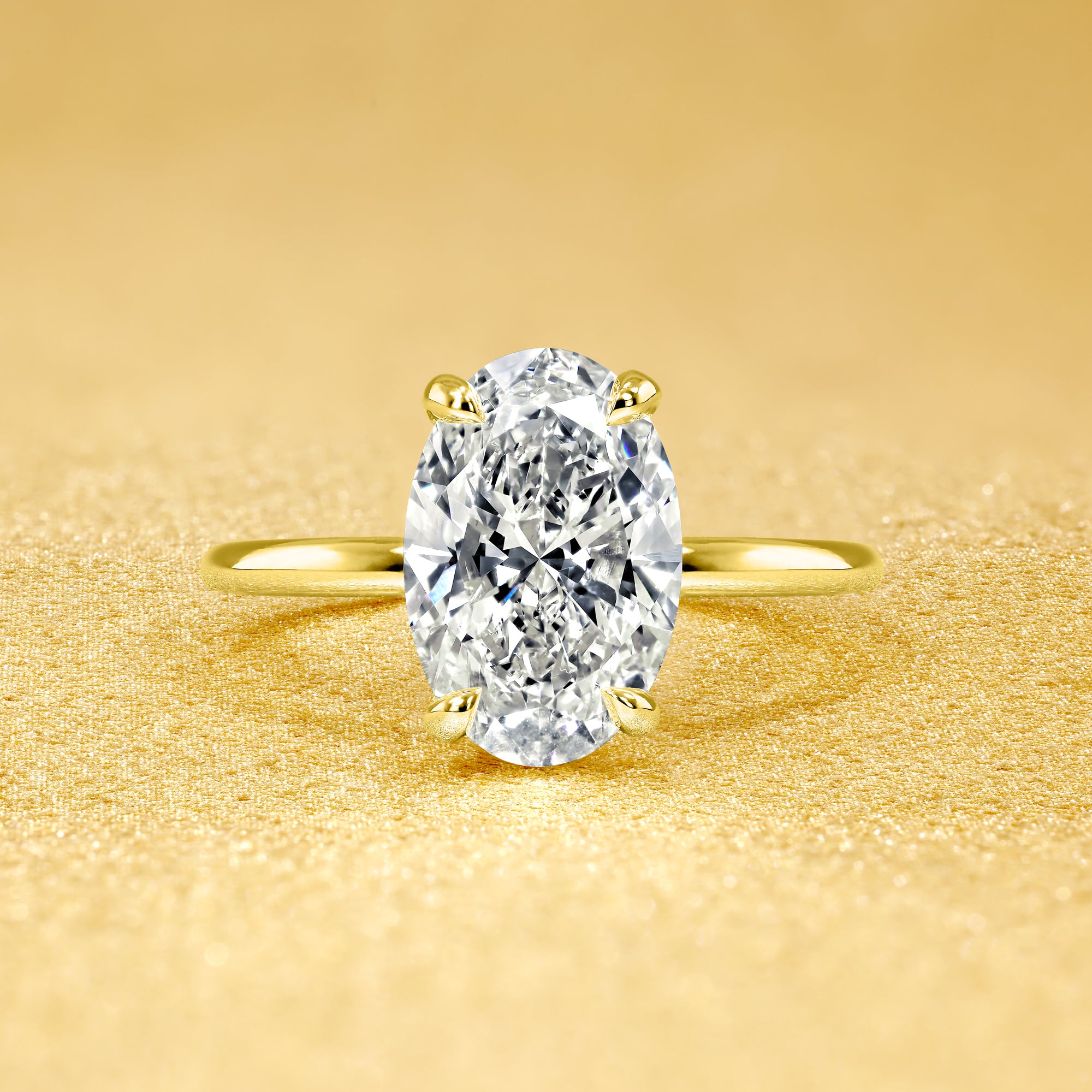 Classic Ariela 2ct Elongated Oval-Cut Lab-Grown Diamond Hidden Eternity Halo Solitaire Engagement Ring in 14K Gold, 18K Gold, or Platinum by Earthena Jewelry of Beverly Hills.
