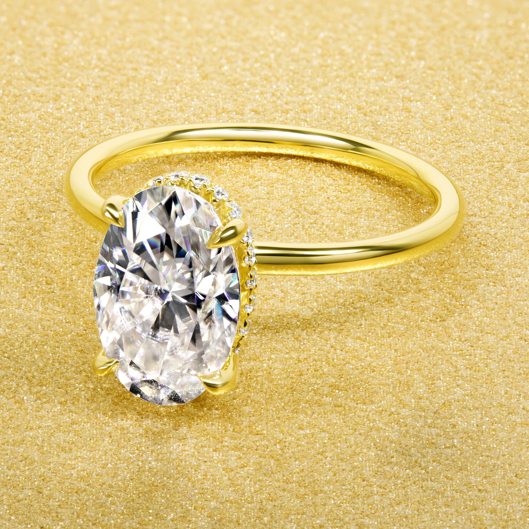 Classic Ariela 3ct Elongated Oval-cut Moissanite and Lab Diamond Hidden Halo Solitaire ring in 14K Gold, 18K Gold, or Platinum by Earthena Jewelry of Beverly Hills.