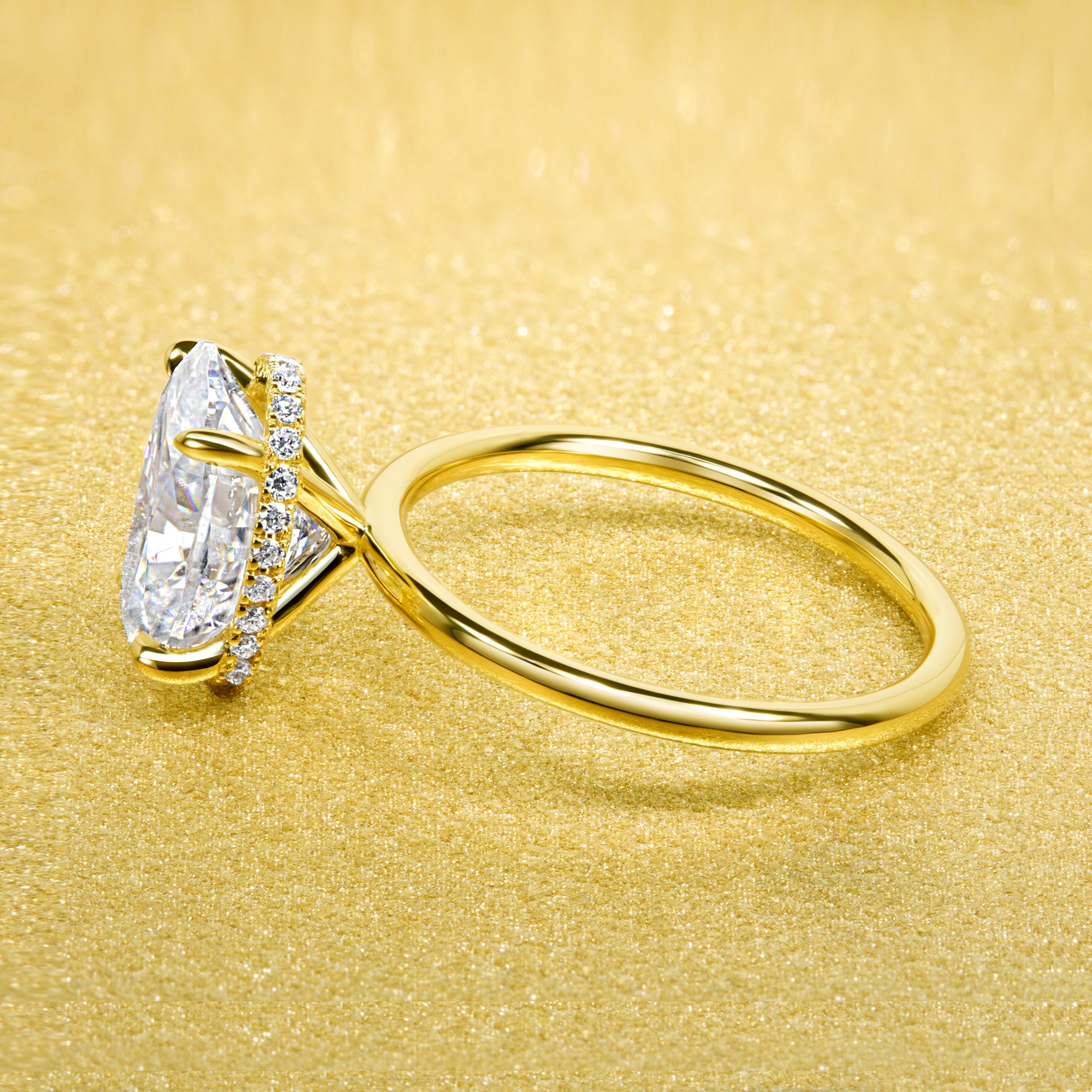 Classic Ariela 3ct Elongated Oval-cut Moissanite and Lab Diamond Hidden Halo Solitaire ring in 14K Gold, 18K Gold, or Platinum by Earthena Jewelry of Beverly Hills.