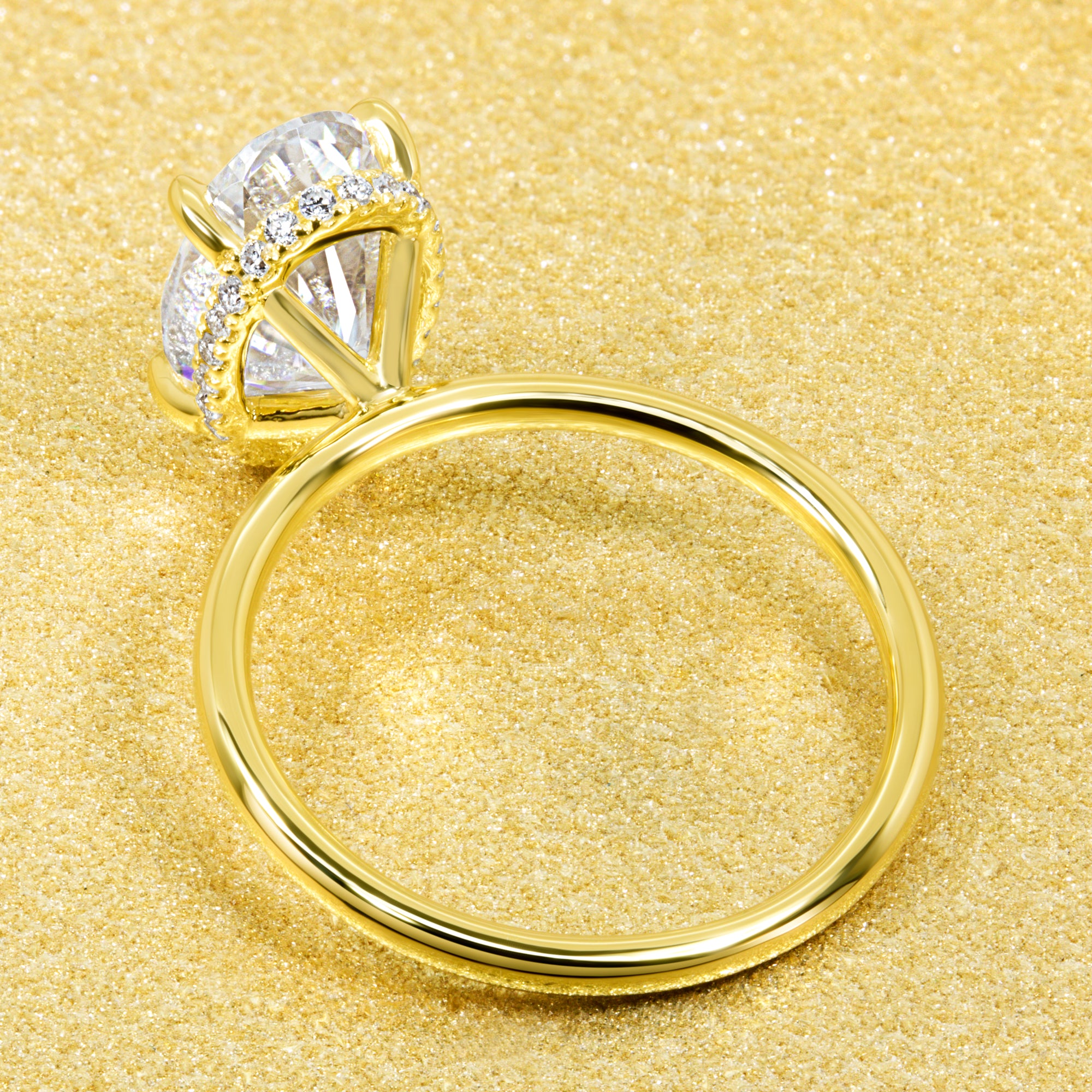 Classic Ariela 3ct Elongated Oval-cut Moissanite and Lab Diamond Hidden Halo Solitaire ring in 14K Gold, 18K Gold, or Platinum by Earthena Jewelry of Beverly Hills.