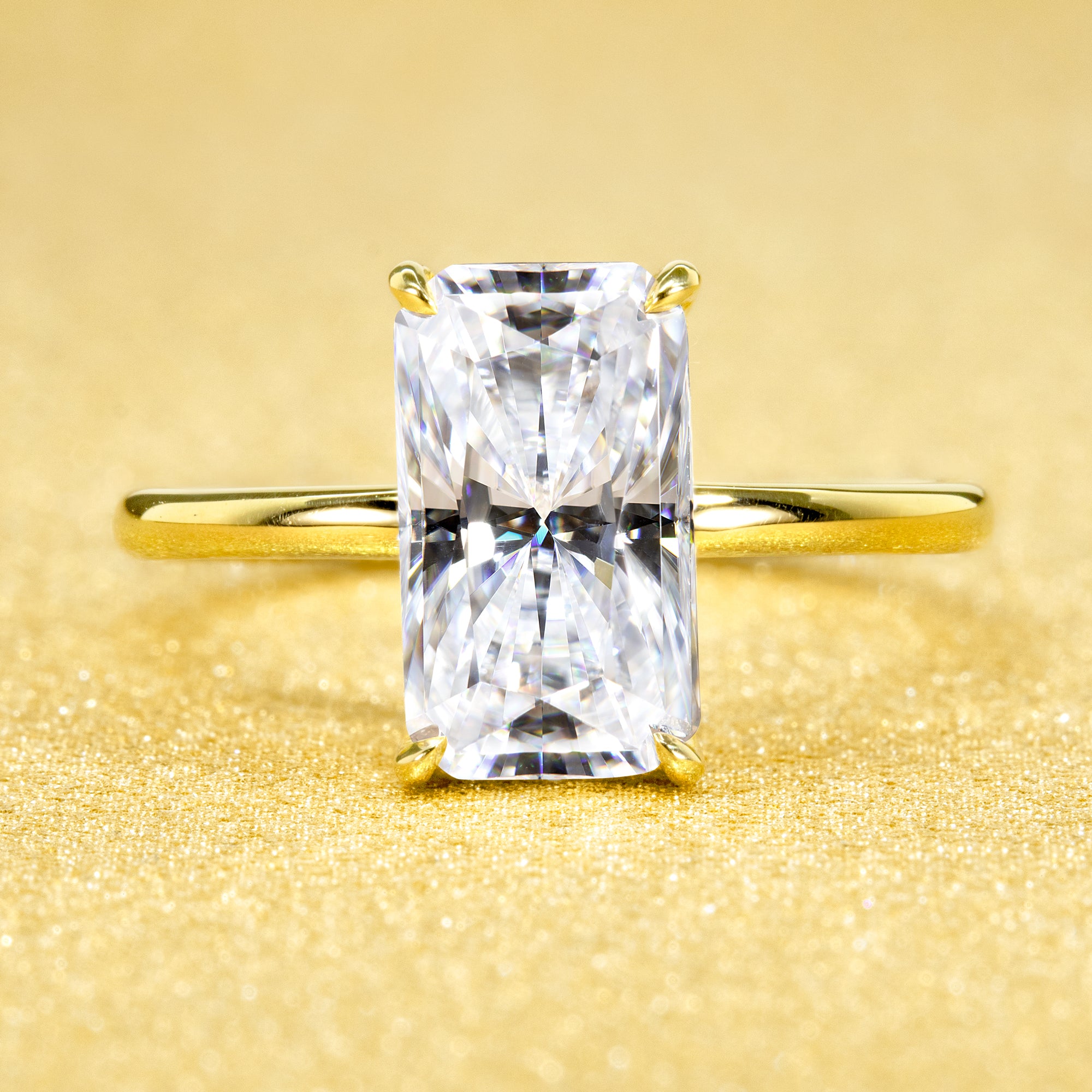 Classic Ariela 3ct Elongated Radiant-cut Moissanite Halo Solitaire Engagement ring complemented by Lab Diamonds handcrafted in 14K Gold, 18K Gold, or Platinum by Earthena Jewelry of Beverly Hills.