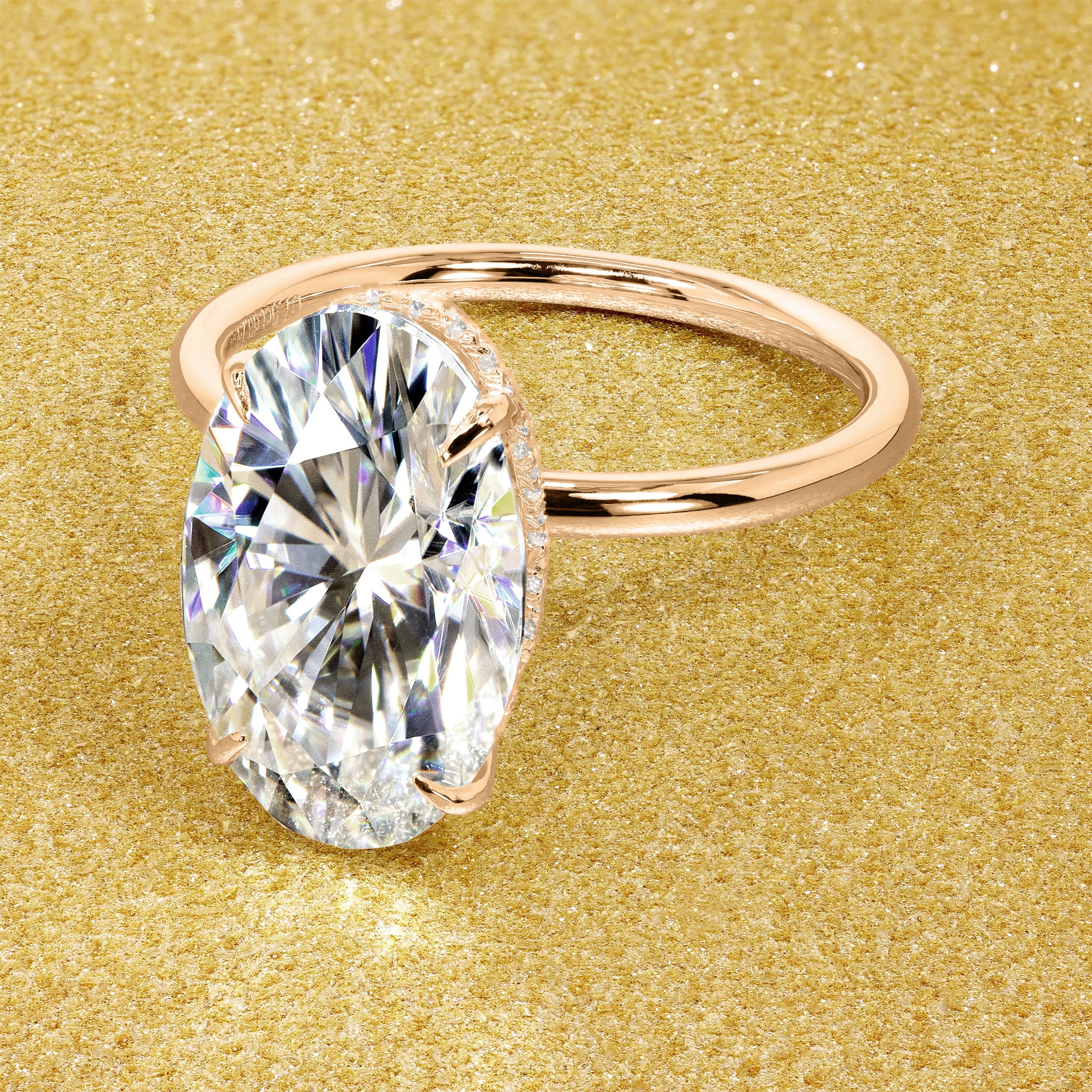 Classic Ariela 7ct Elongated Oval-cut Moissanite and Lab Diamond Hidden Halo Solitaire ring in 14K gold, 18K gold, or Platinum handcrafted in Los Angeles by Earthena Jewelry
