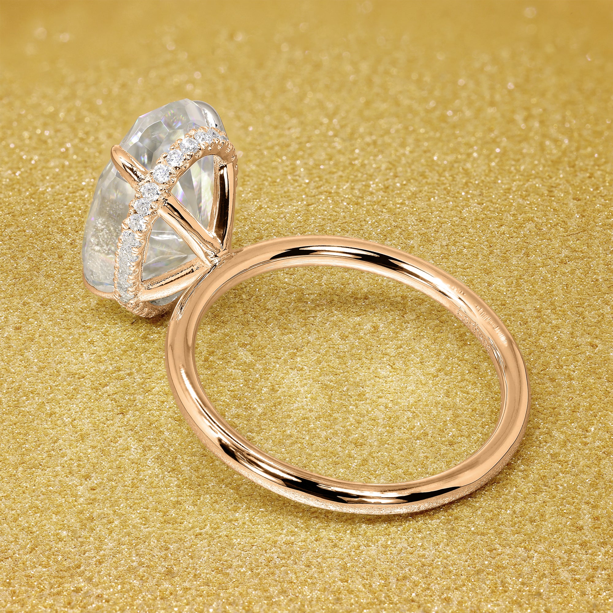 Classic Ariela 7ct Elongated Oval-cut Moissanite and Lab Diamond Hidden Halo Solitaire ring in 14K gold, 18K gold, or Platinum handcrafted in Los Angeles by Earthena Jewelry