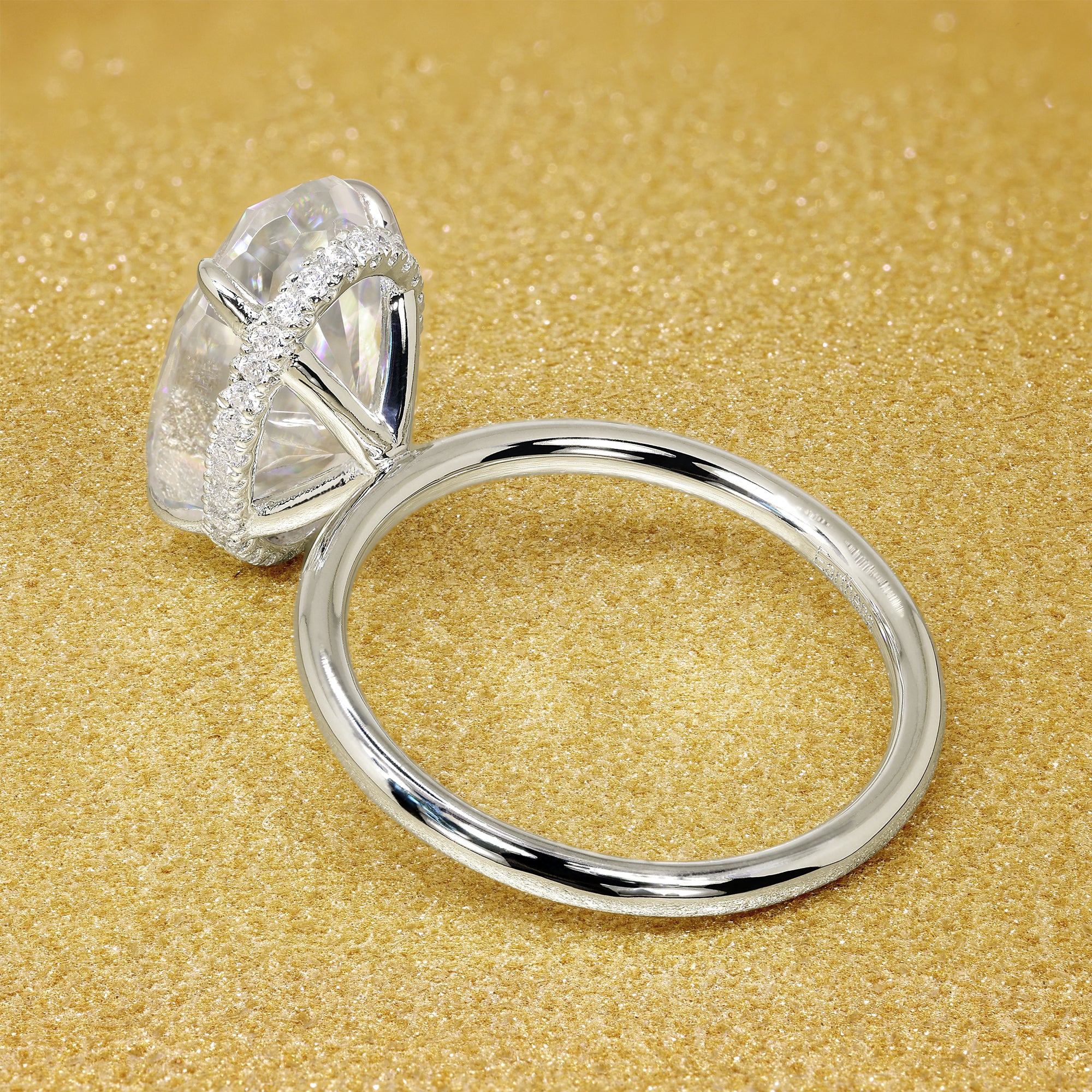 Classic Ariela 7ct Elongated Oval-cut Moissanite and Lab Diamond Hidden Halo Solitaire ring in 14K gold, 18K gold, or Platinum handcrafted in Los Angeles by Earthena Jewelry