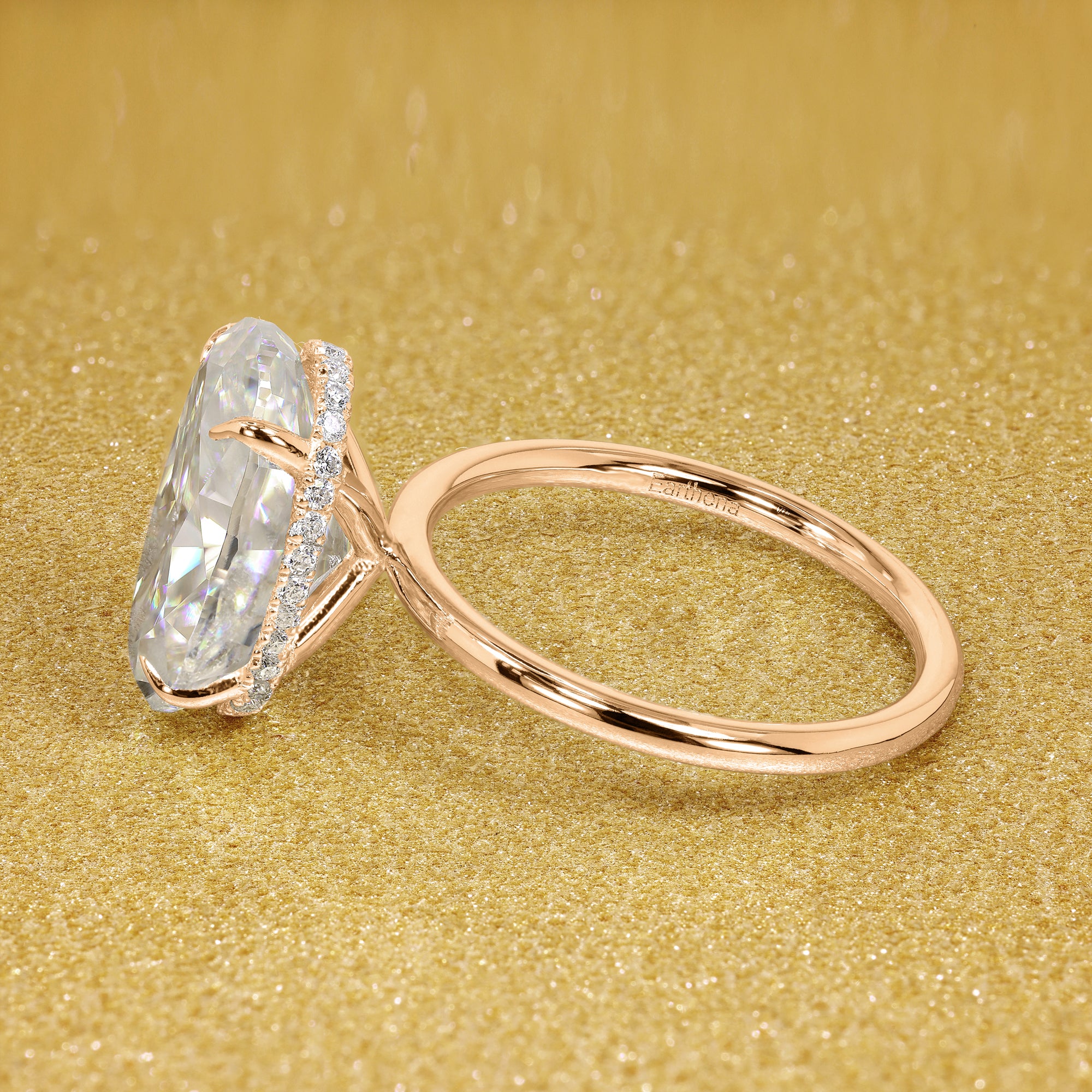 Classic Ariela 7ct Elongated Oval-cut Moissanite and Lab Diamond Hidden Halo Solitaire ring in 14K gold, 18K gold, or Platinum handcrafted in Los Angeles by Earthena Jewelry