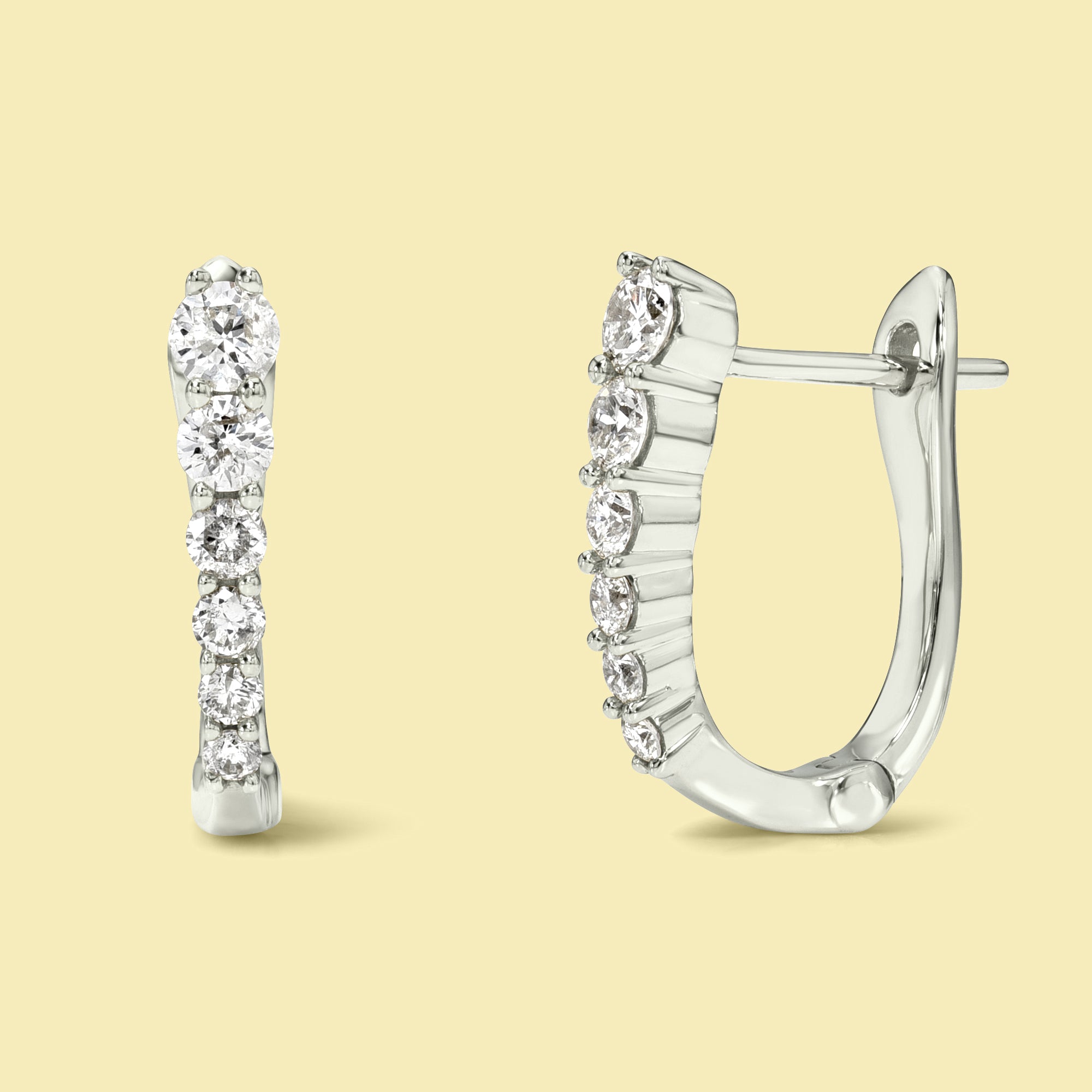 The Audrey, Graduated Straight Huggie Diamond Earrings are handcrafted in 14K gold, 18K gold, or Platinum by Earthena Jewelry of Beverly Hills.