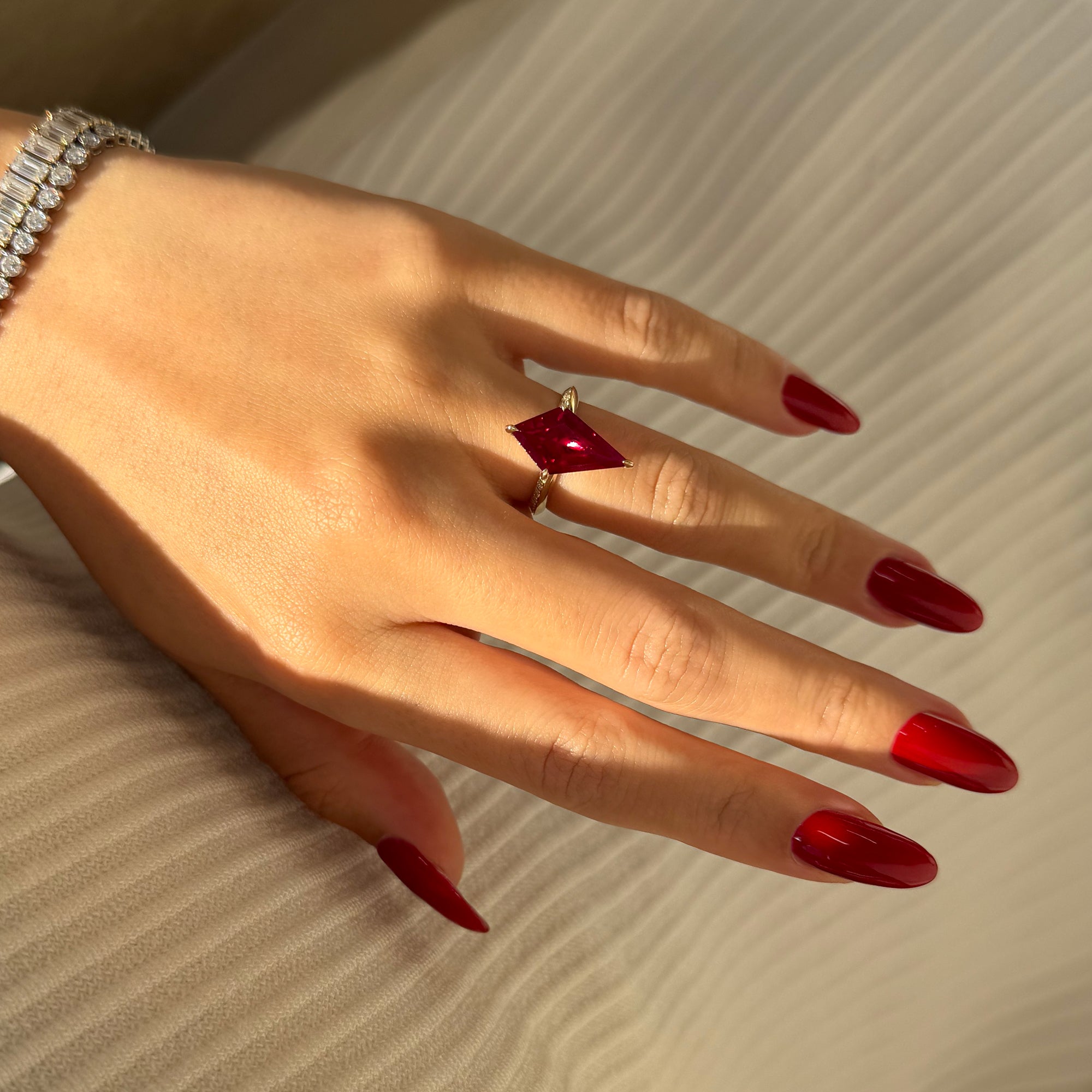 The Axis, 5.5ct Kite-Cut Lab-grown Ruby Hidden Eternity Halo Ring by Earthena Jewelry of Beverly Hills.