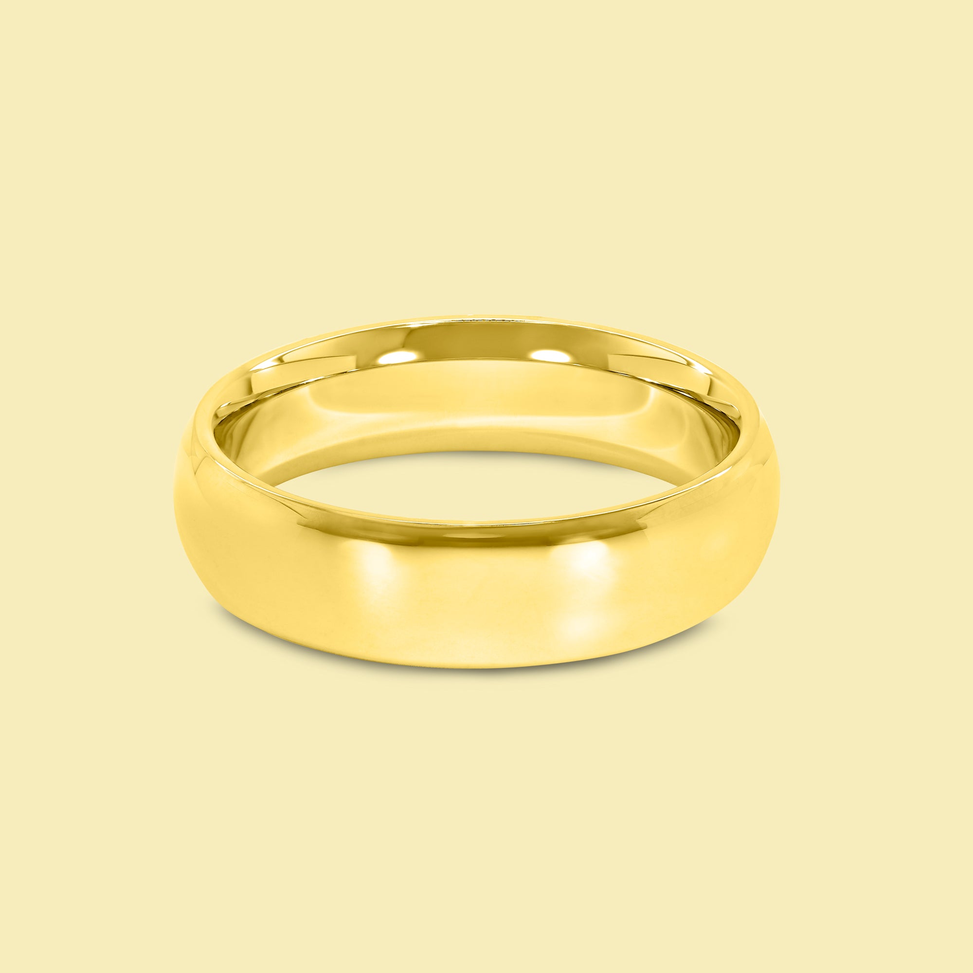 The Bennett Solid Gold 6mm Classic Dome High Polish Comfort Fit Men's Wedding Band in 14K Gold, 18K Gold, or Platinum by Earthena Jewelry of Beverly Hills.