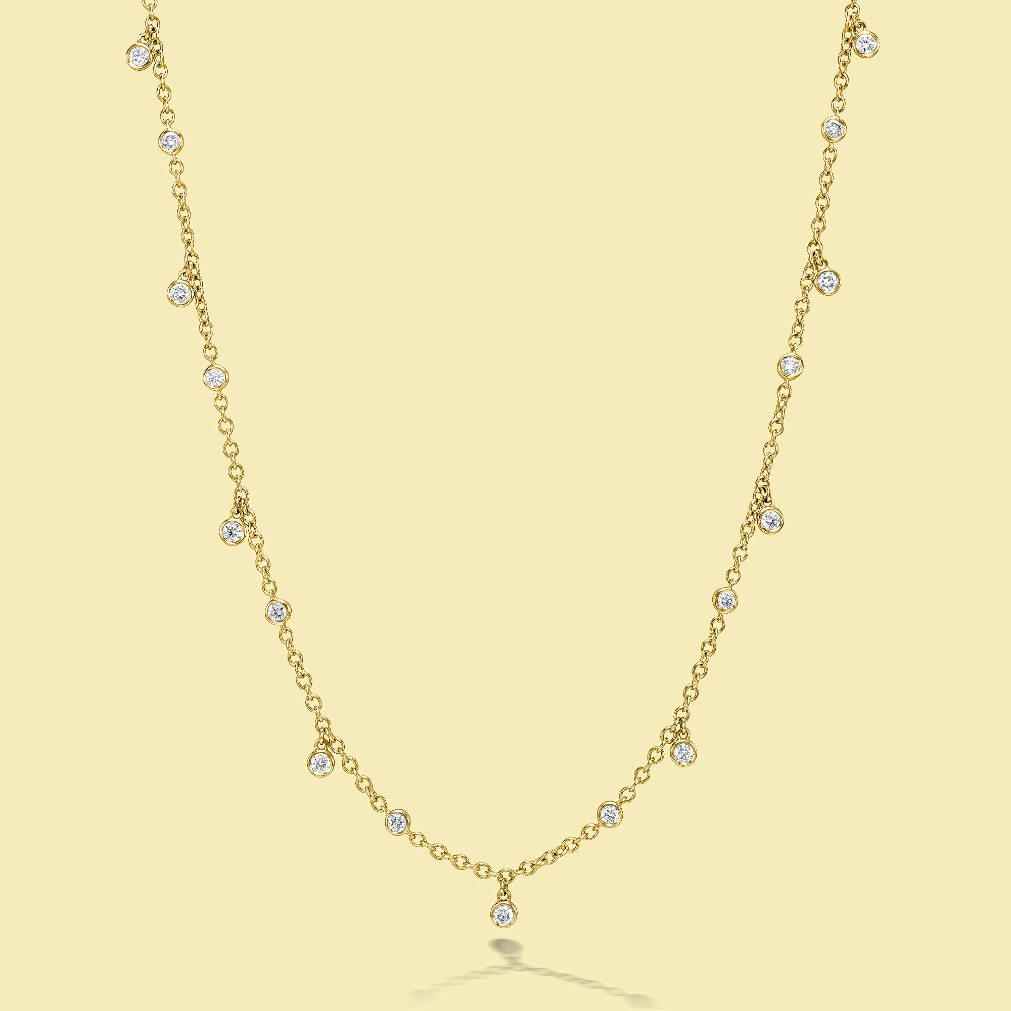 The Cloud, Dangle Strand Diamond Necklace is handcrafted in 14K Gold, 18K Gold, or Platinum by Earthena Jewelry of Beverly Hills.