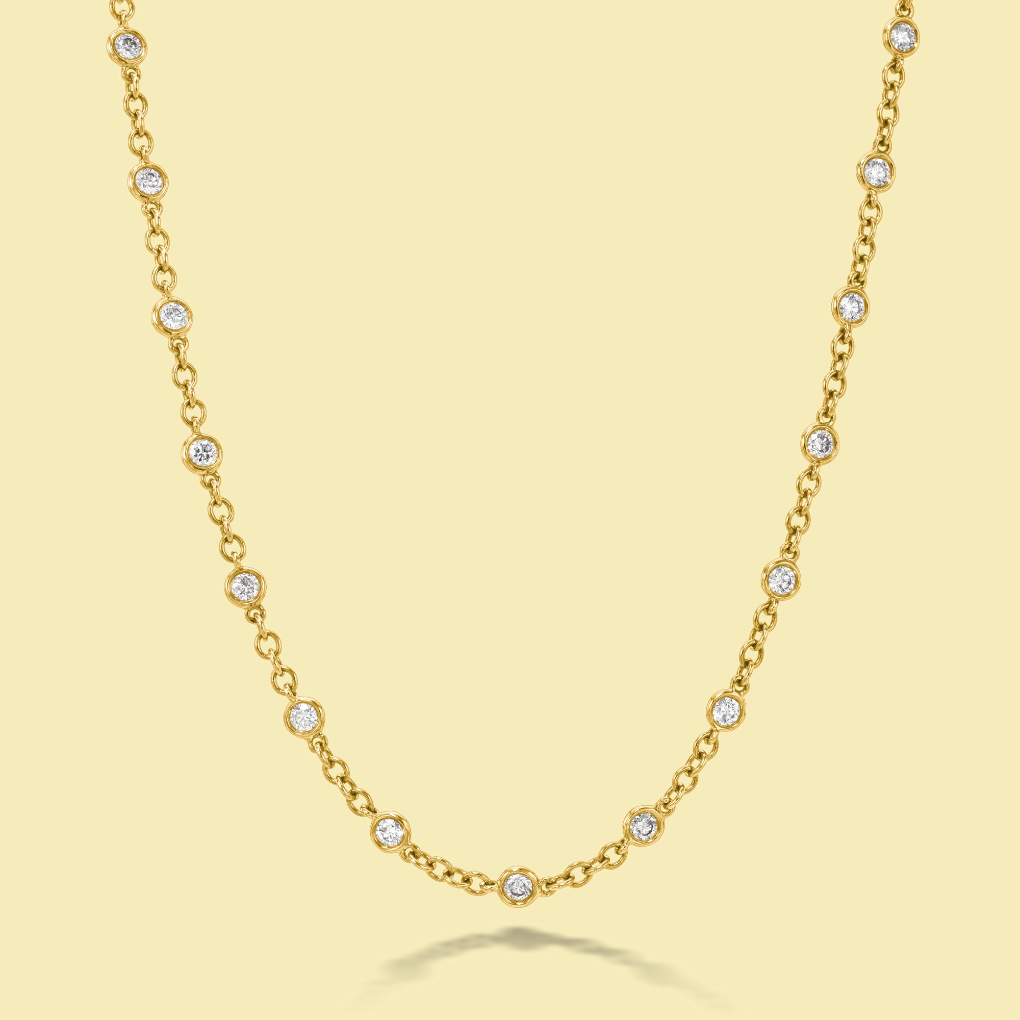 The Cloud, Essential Strand Diamond-by-the-yard Bezel Diamond Necklace is handcrafted in 14K Gold, 18K Gold, or Platinum by Earthena Jewelry in Beverly Hills.