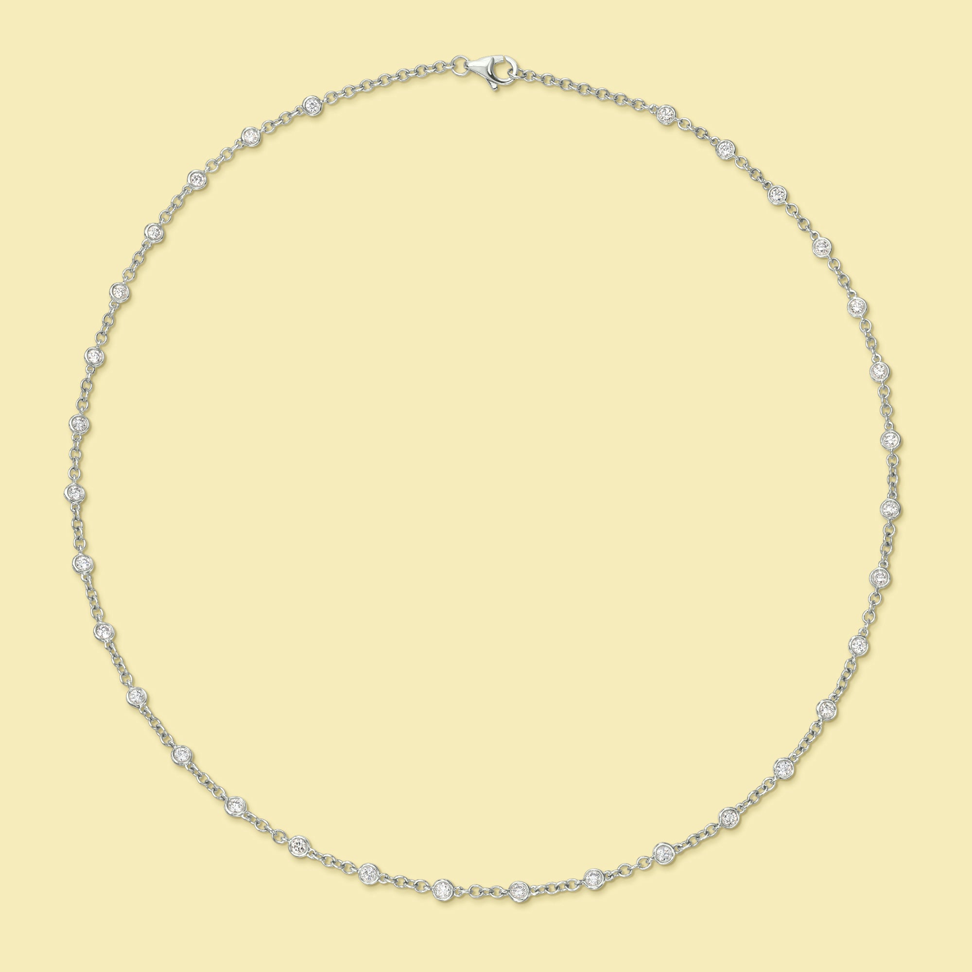 The Cloud, Essential Strand Diamond-by-the-yard Bezel Diamond Necklace is handcrafted in 14K Gold, 18K Gold, or Platinum by Earthena Jewelry in Beverly Hills.