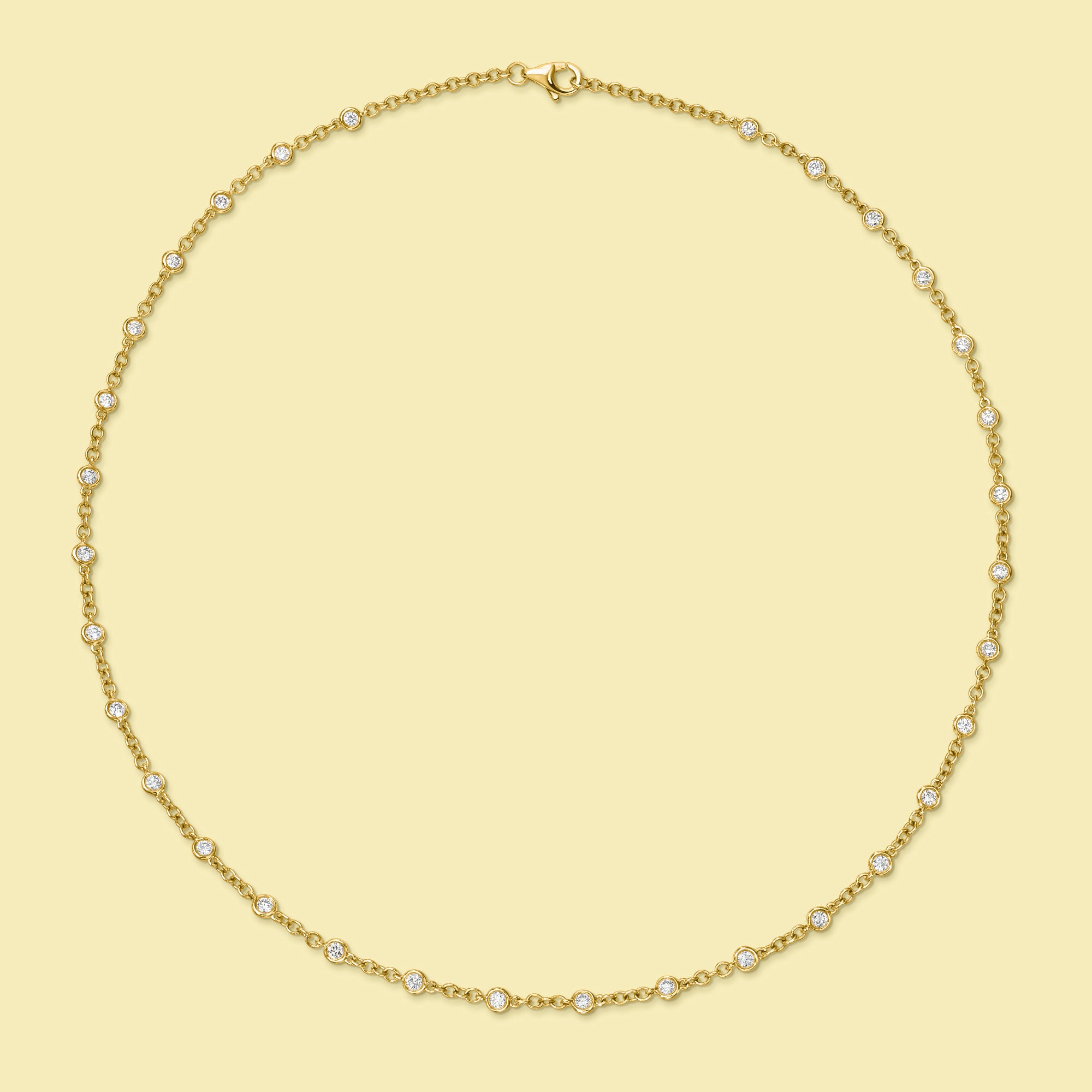 The Cloud, Essential Strand Diamond-by-the-yard Bezel Diamond Necklace is handcrafted in 14K Gold, 18K Gold, or Platinum by Earthena Jewelry in Beverly Hills.