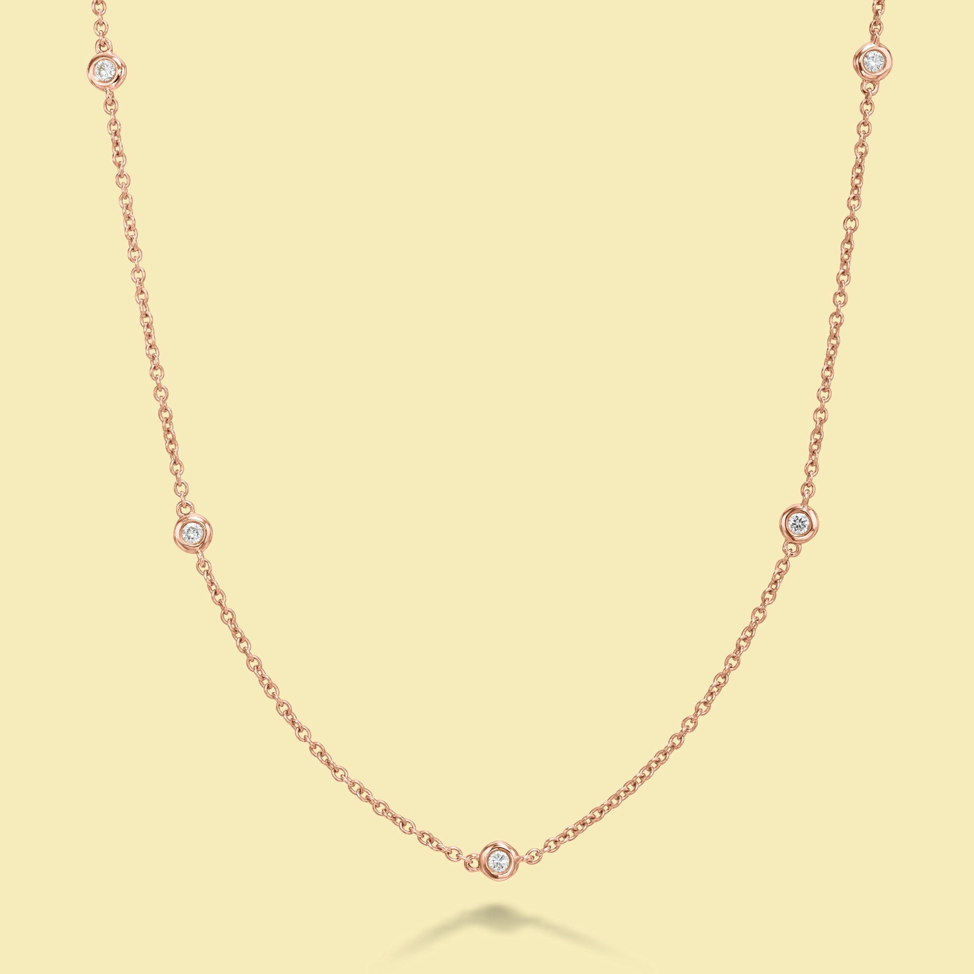 The Cloud, Classic Half-strand Bezel Diamond Necklace is handcrafted in 14K Gold, 18K Gold, or Platinum by Earthena Jewelry in Beverly Hills