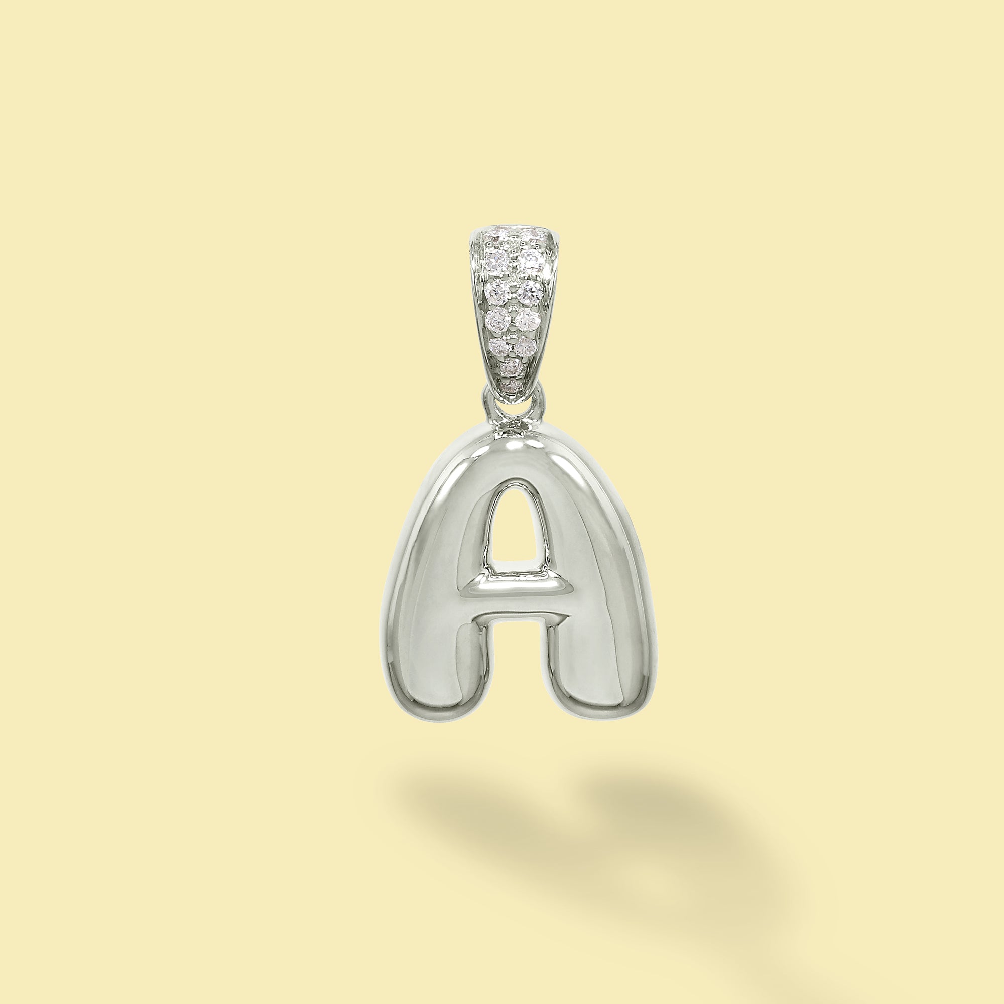 The Cloud, Gold Initial Diamond Puff Charm Pendant handcrafted in 14K Gold by Earthena Jewelry of Beverly Hills, California.