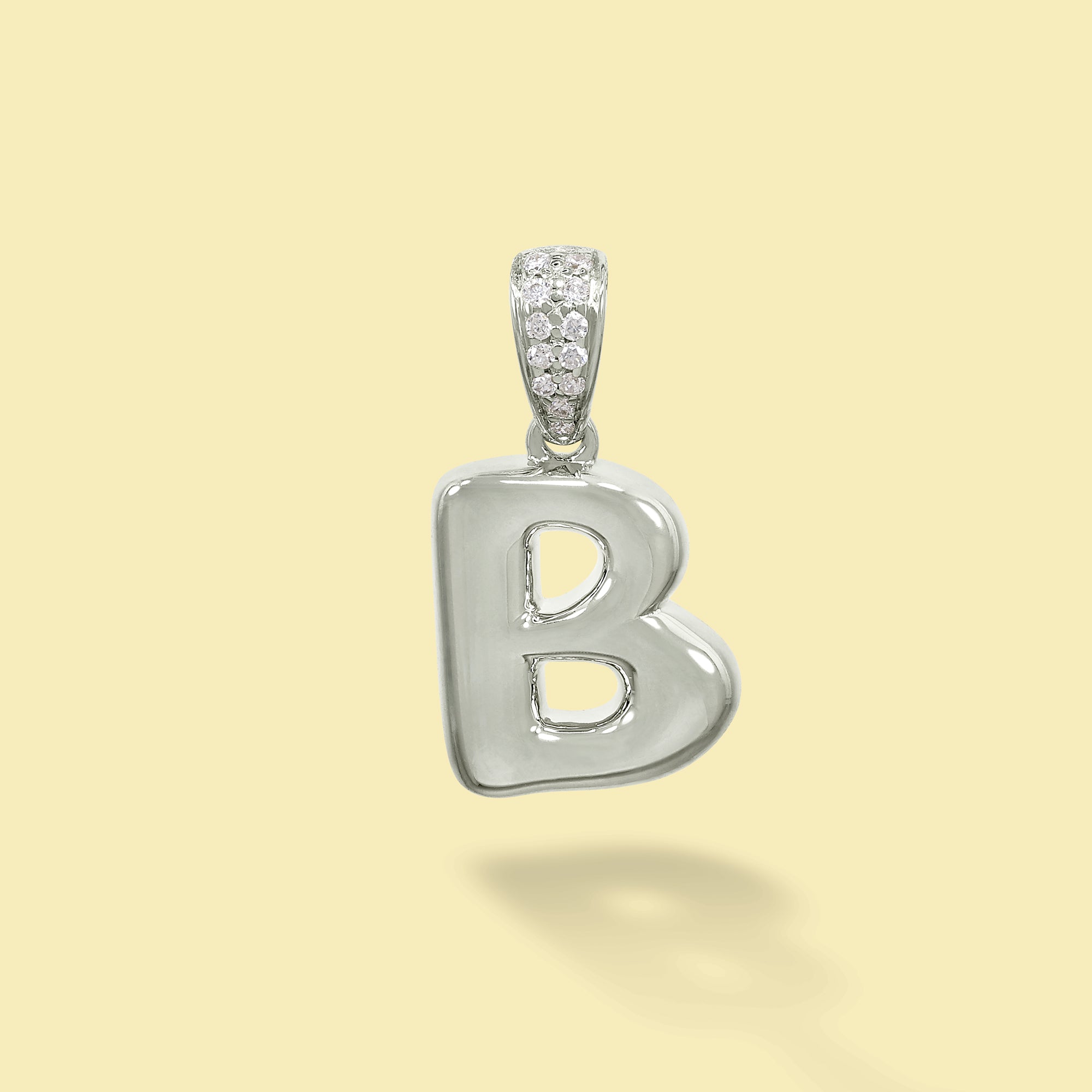 The Cloud, Gold Initial Diamond Puff Charm Pendant handcrafted in 14K Gold by Earthena Jewelry of Beverly Hills, California.