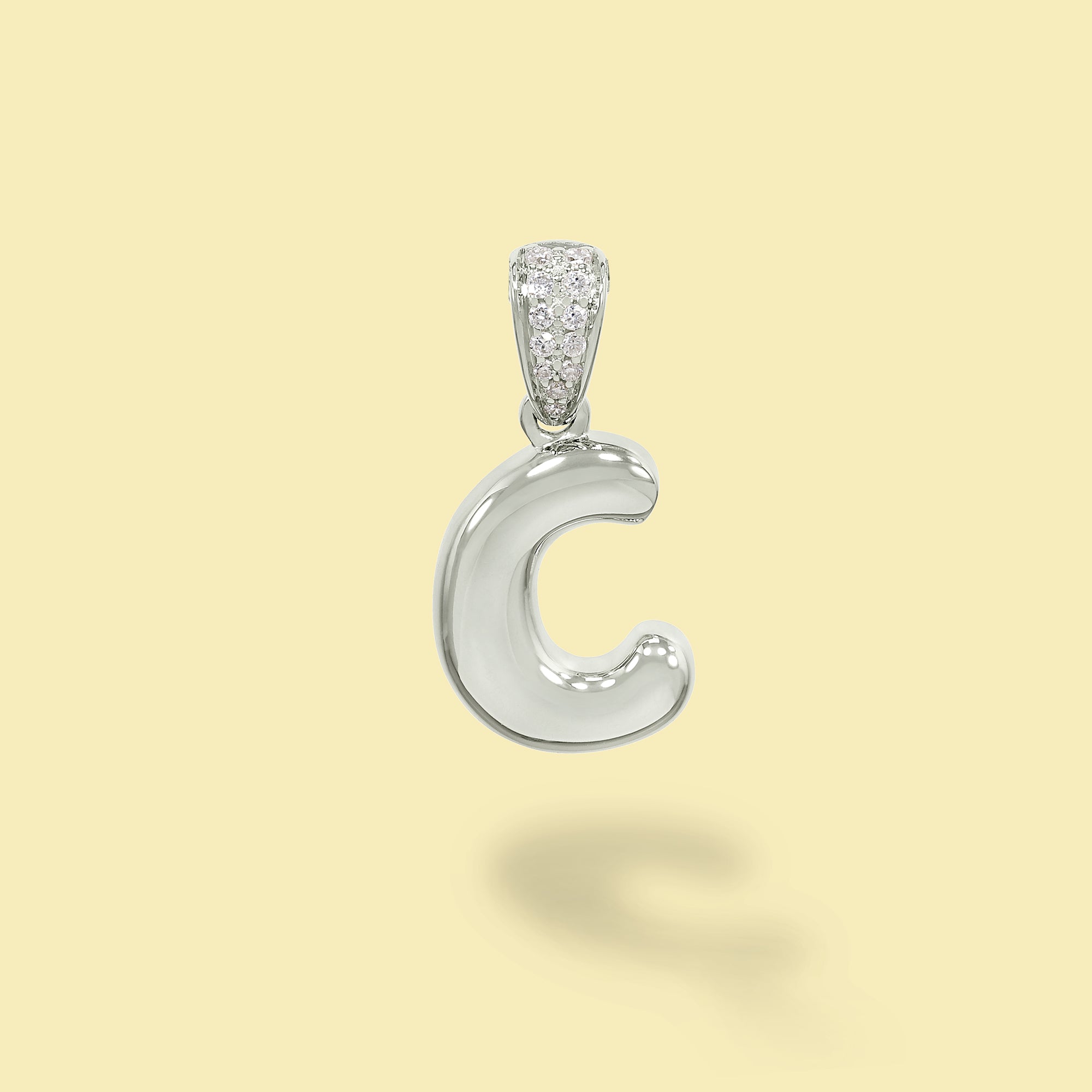 The Cloud, Gold Initial Diamond Puff Charm Pendant handcrafted in 14K Gold by Earthena Jewelry of Beverly Hills, California.