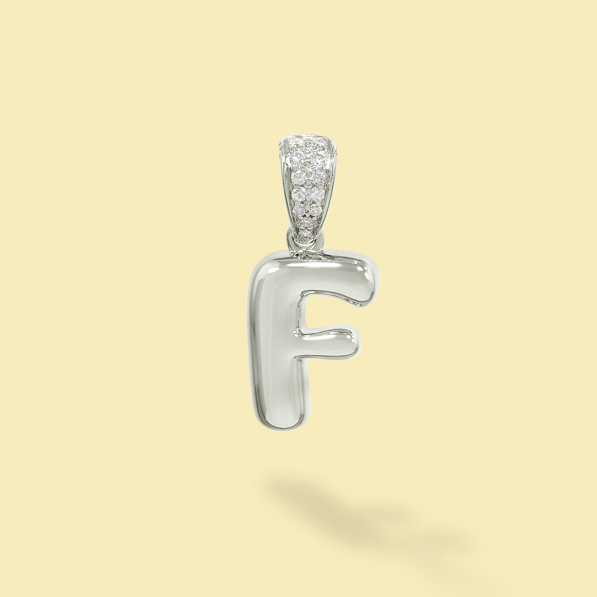 The Cloud, Gold Initial Diamond Puff Charm Pendant handcrafted in 14K Gold by Earthena Jewelry of Beverly Hills, California.