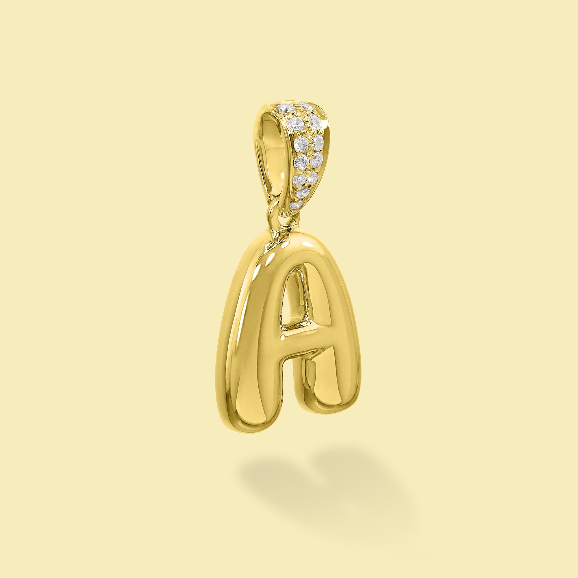 The Cloud, Gold Initial Diamond Puff Charm Pendant handcrafted in 14K Gold by Earthena Jewelry of Beverly Hills, California.