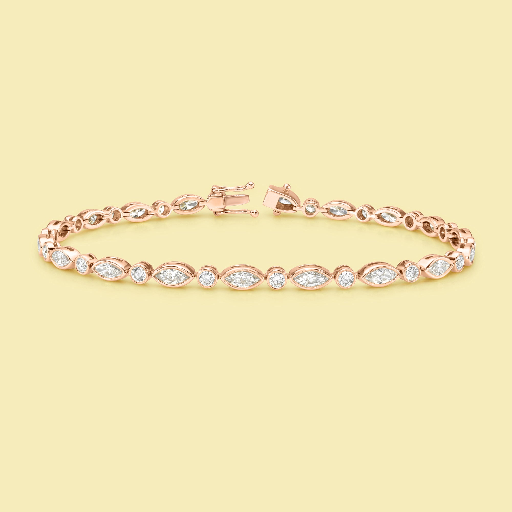 The Fiona, Marquise and Round Diamond Tennis Bracelet is handcrafted in 14K gold, 18K gold, or Platinum by Earthena Jewelry of Beverly Hills.