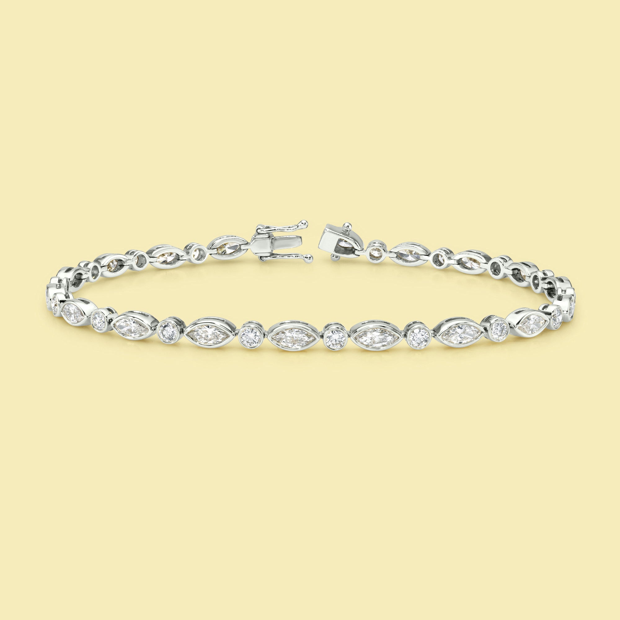 The Fiona, Marquise and Round Diamond Tennis Bracelet is handcrafted in 14K gold, 18K gold, or Platinum by Earthena Jewelry of Beverly Hills.