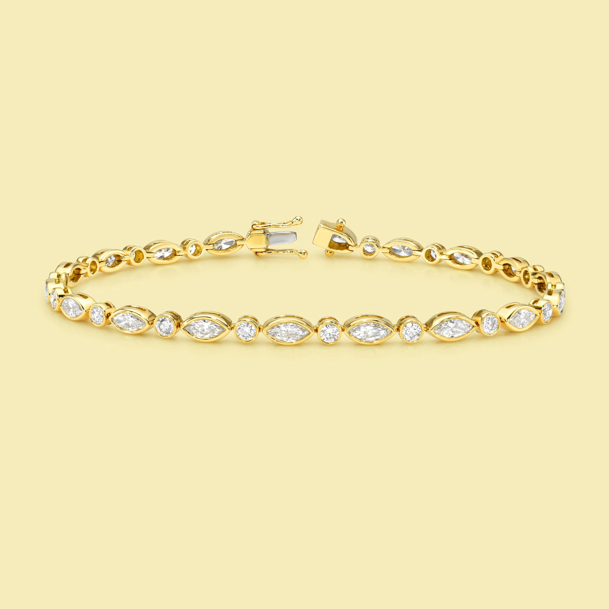 The Fiona, Marquise and Round Diamond Tennis Bracelet is handcrafted in 14K gold, 18K gold, or Platinum by Earthena Jewelry of Beverly Hills.