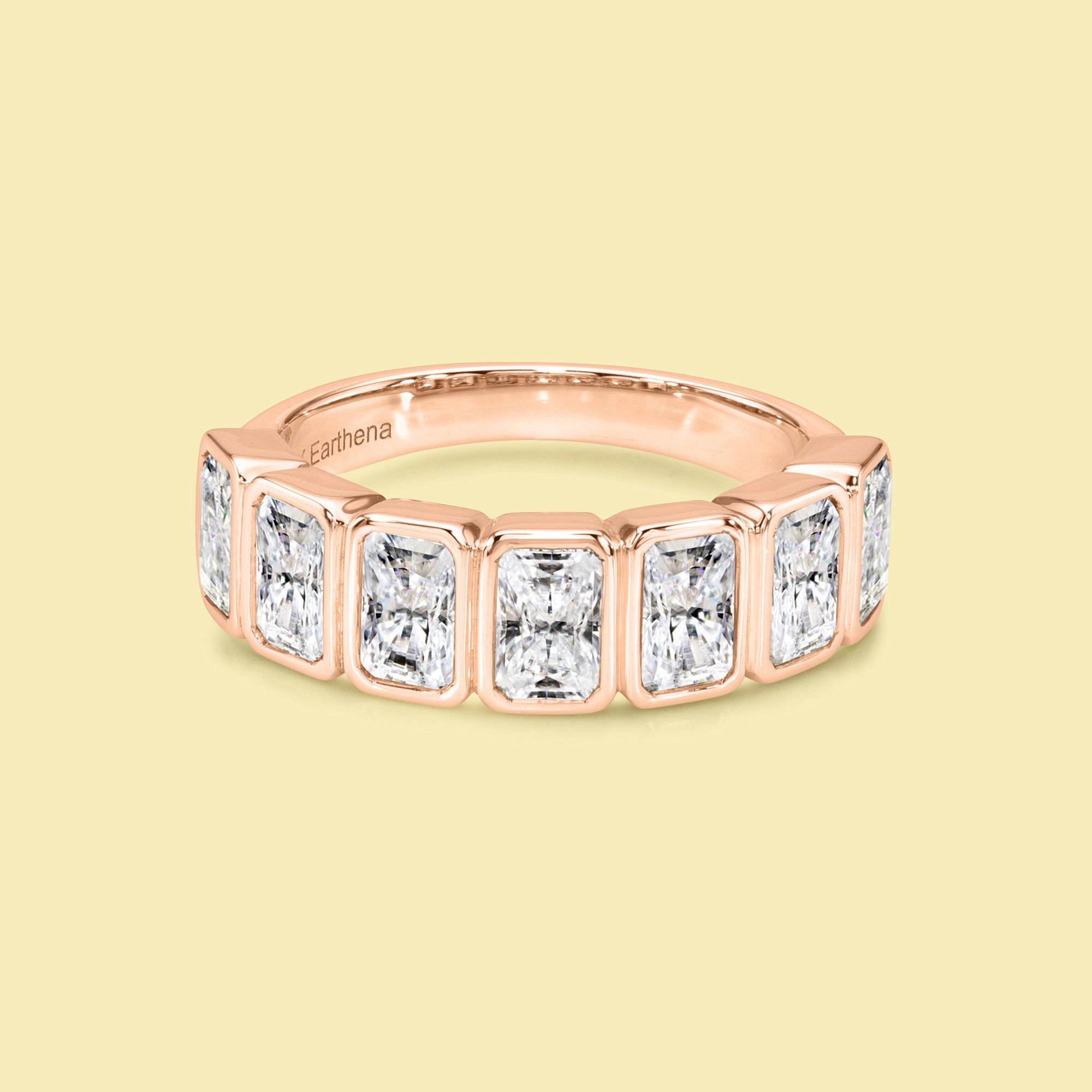 The Fiona, Bezel-set Radiant-cut Diamond Half Eternity Band handcrafted by Earthena Jewelry of Beverly Hills.