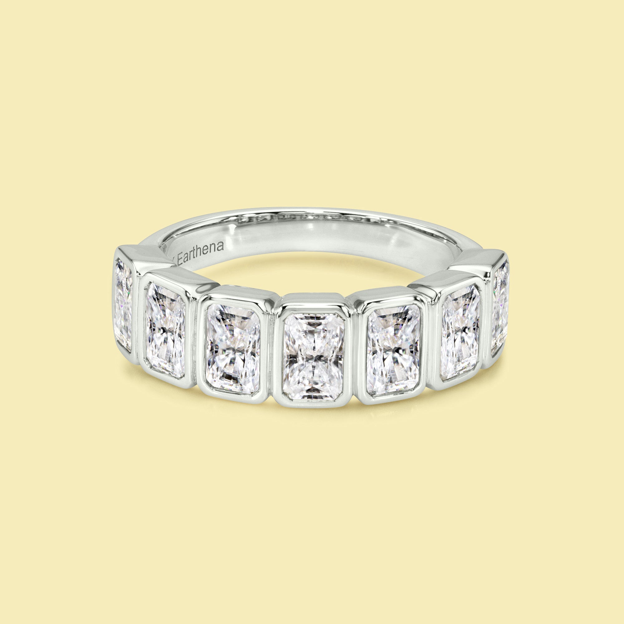 The Fiona, Bezel-set Radiant-cut Diamond Half Eternity Band handcrafted by Earthena Jewelry of Beverly Hills.