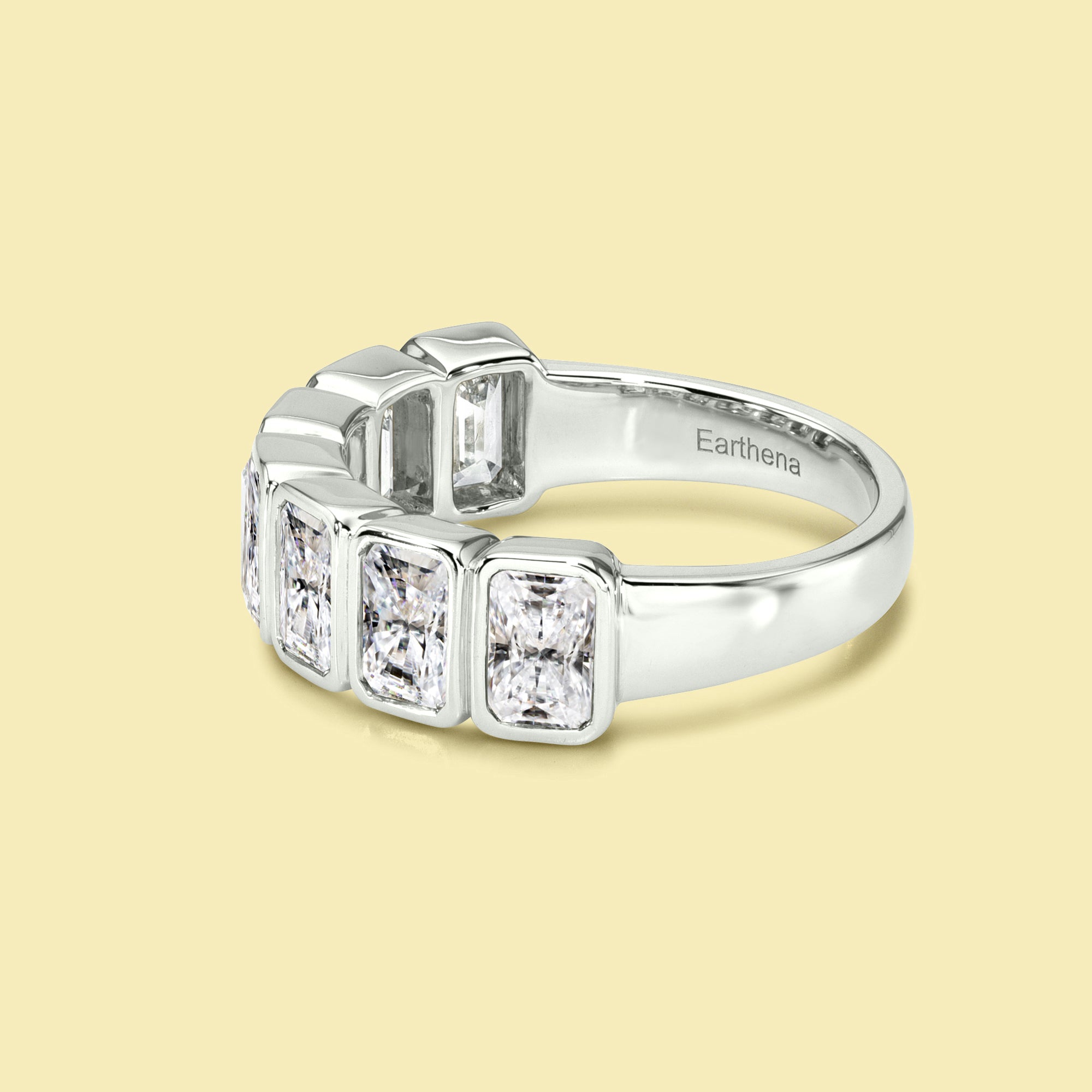 The Fiona, Bezel-set Radiant-cut Diamond Half Eternity Band handcrafted by Earthena Jewelry of Beverly Hills.