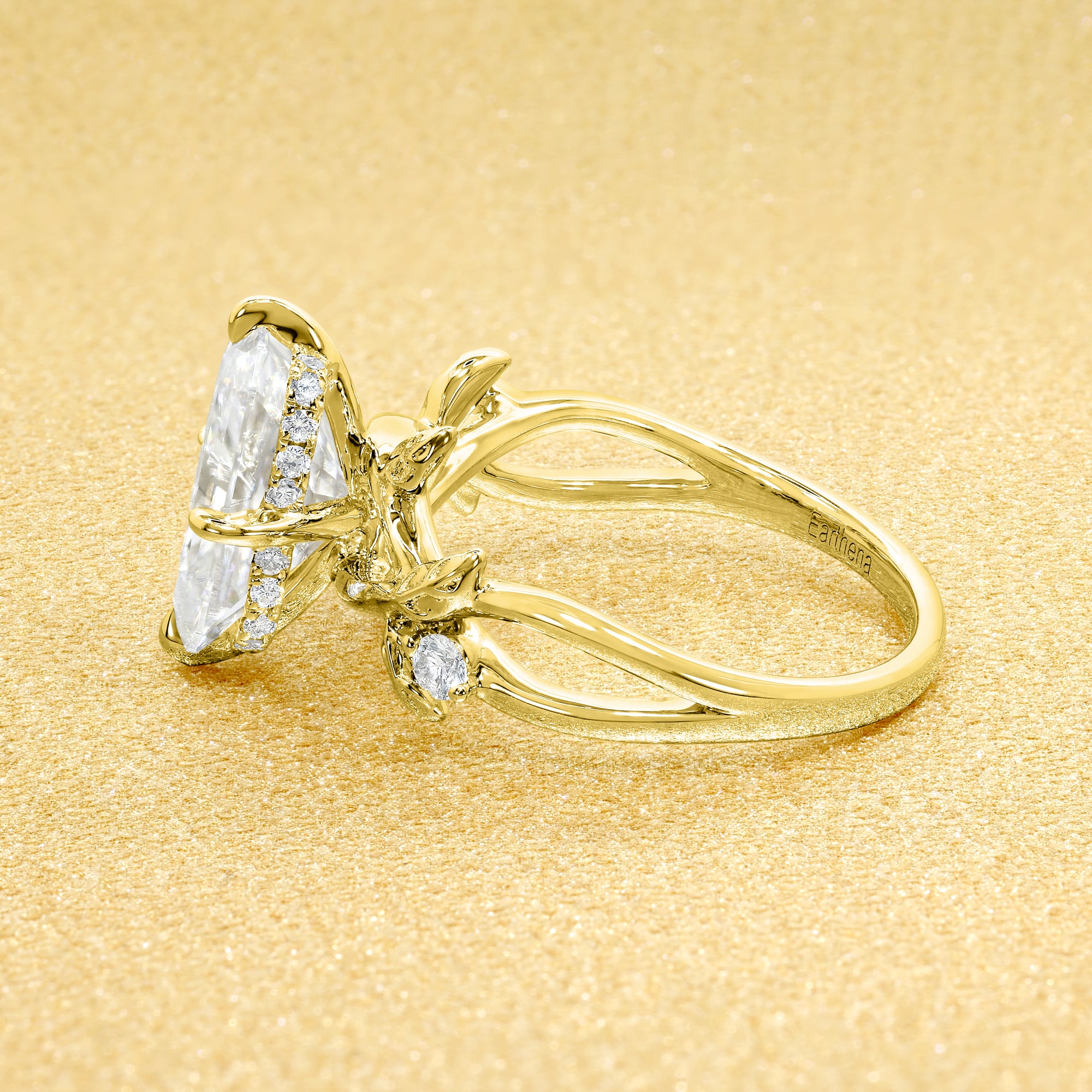 Flora 3ct Elongated Radiant-cut Moissanite Compass Hidden Halo Floral Lab-grown Diamond Engagement ring in 14K gold, 18K gold, or Platinum by Earthena Jewelry of Beverly Hills.