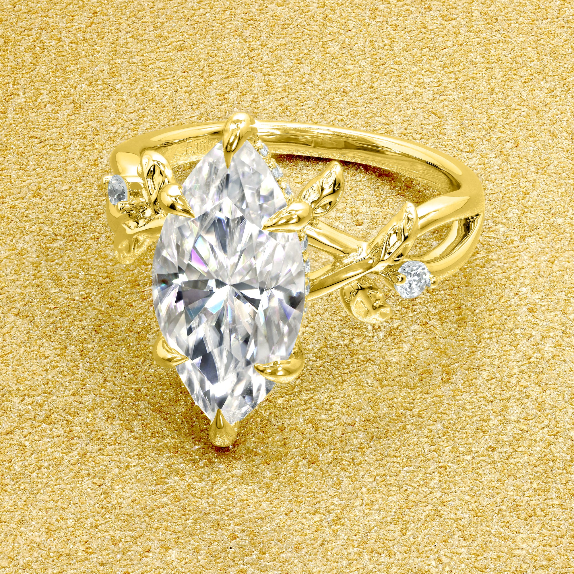 Flora 3ct Marquise cut Moissanite Hidden Halo Floral Engagement Ring in 14K Gold, 18K Gold, or Platinum by Earthena Jewelry of Beverly Hills.