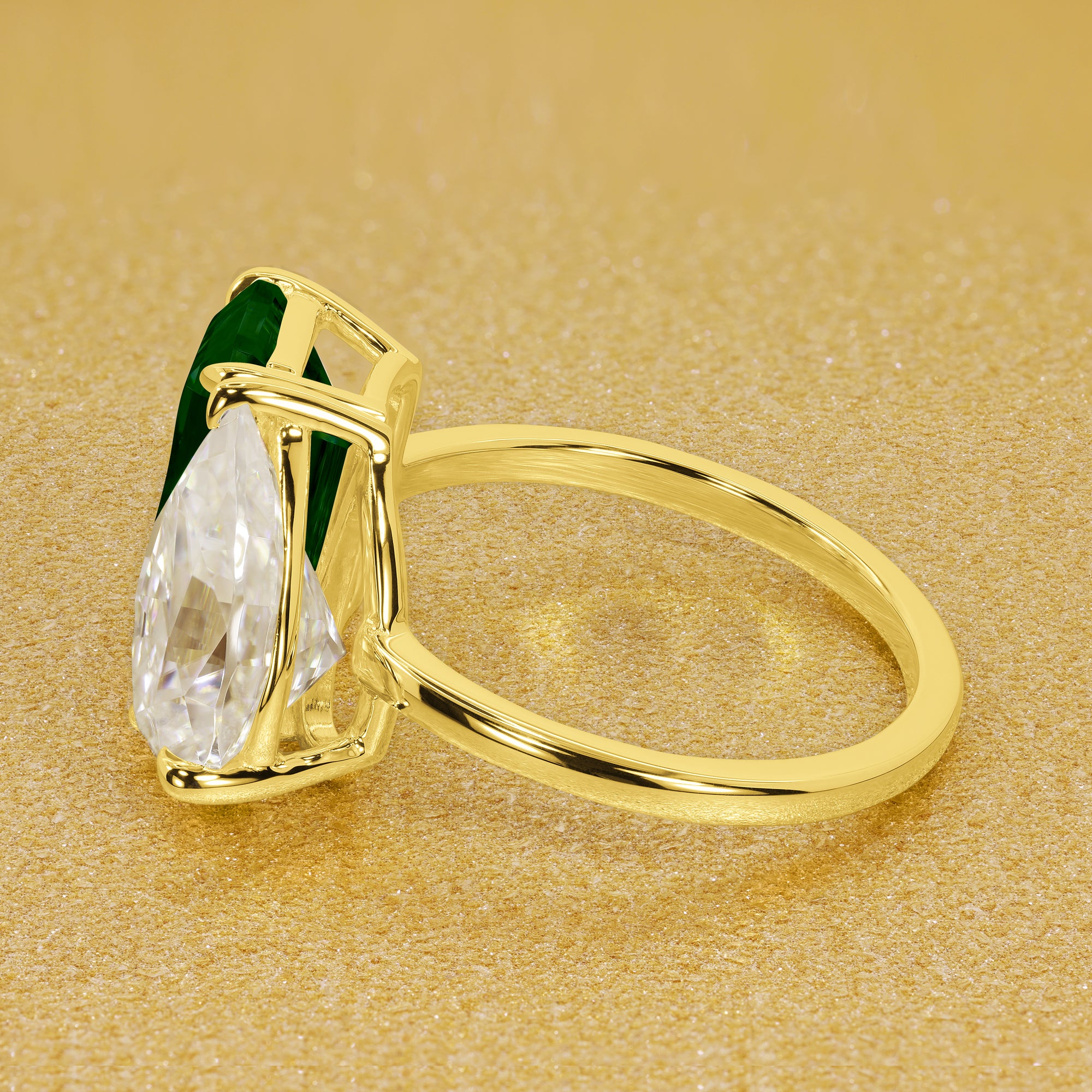 This timeless "Toi et Moi" Gemini Sleek engagement ring showcases a captivating combination of a 3.75ct lab-grown elongated green emerald and a 2.25ct pear-shaped moissanite in a minimalistic plain gold band setting. The ring is available in 14K Gold, 18K Gold, or Platinum by Earthena Jewelry of Beverly Hills.