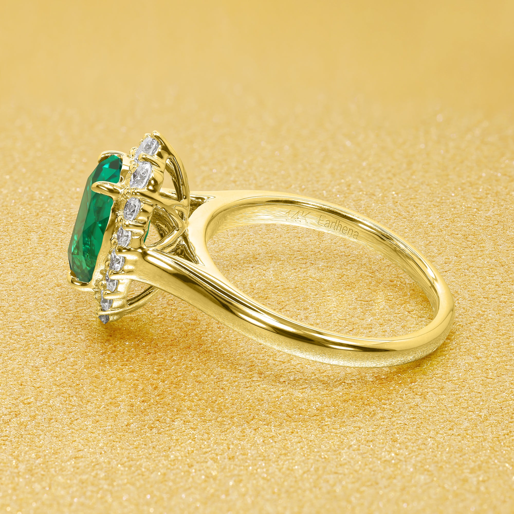 Gloria 1.5ct Elongated Lab-grown Oval-cut Green Emerald Halo Cathedral Engagement Ring in 14K Gold, 18K Gold, or Platinum by Earthena Jewelry of Beverly Hills.