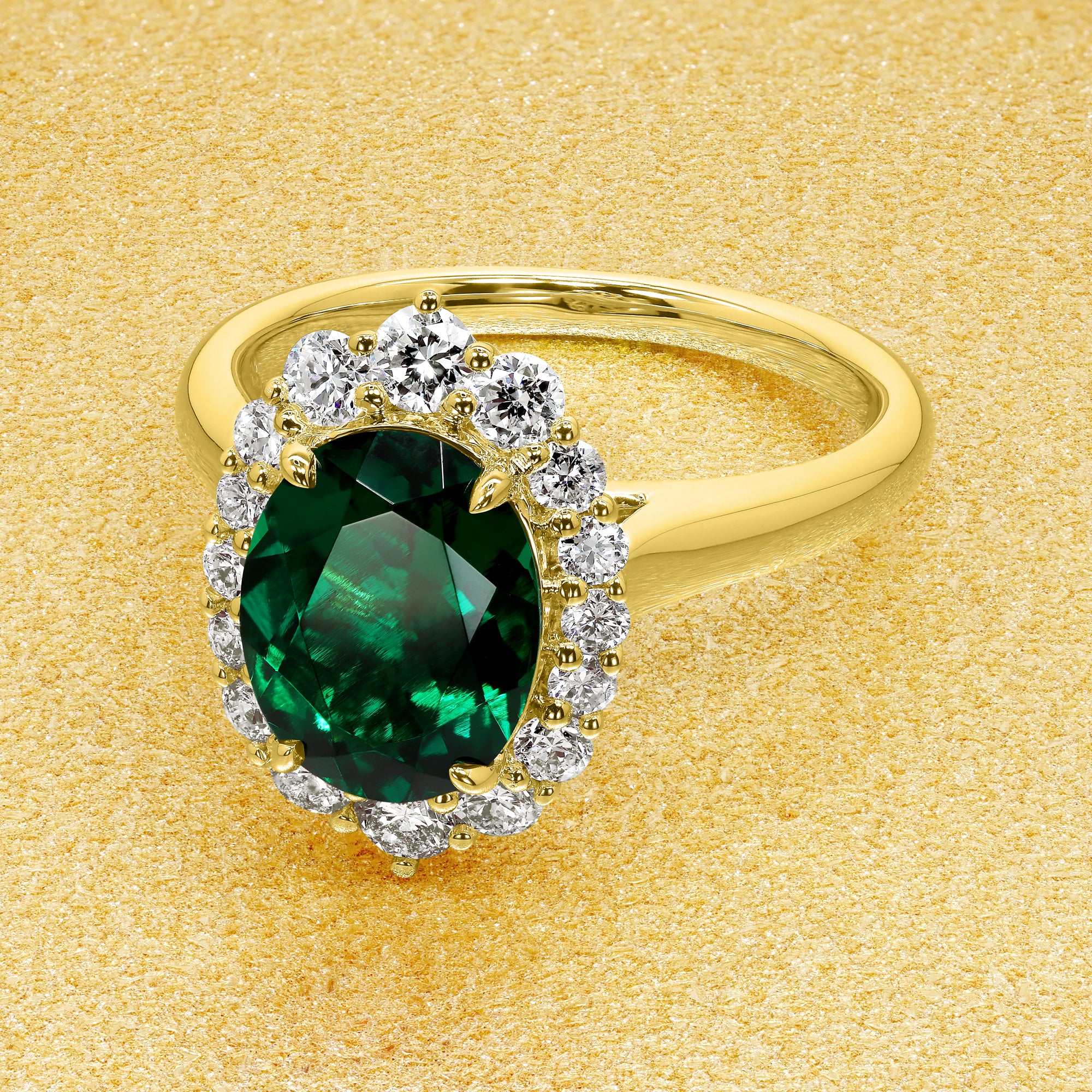 Gloria 1.5ct Elongated Lab-grown Oval-cut Green Emerald Halo Cathedral Engagement Ring in 14K Gold, 18K Gold, or Platinum by Earthena Jewelry of Beverly Hills.