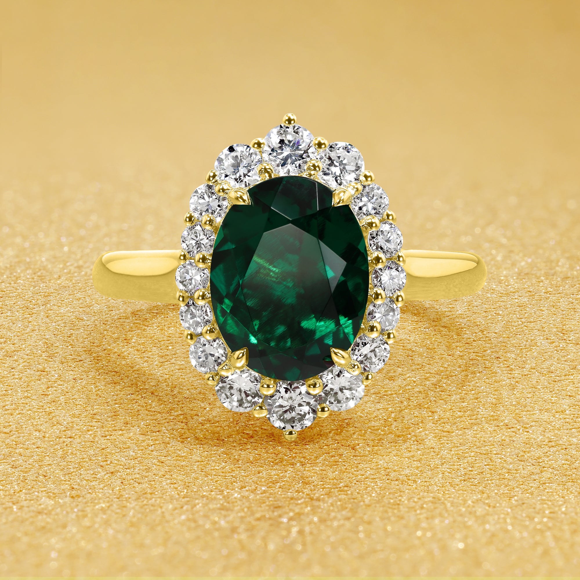 Gloria 1.5ct Elongated Lab-grown Oval-cut Green Emerald Halo Cathedral Engagement Ring in 14K Gold, 18K Gold, or Platinum by Earthena Jewelry of Beverly Hills.