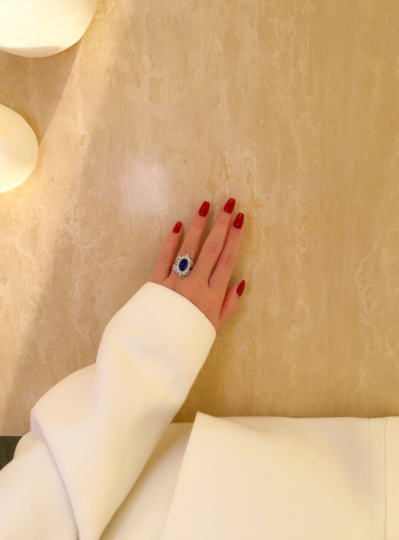 Gloria 4ct Oval Lab-Grown Royal Blue Sapphire with Dual Isabella V-Shaped Diamond Bands in 14K Gold, 18K Gold, or Platinum by Earthena Jewelry of Beverly Hills.