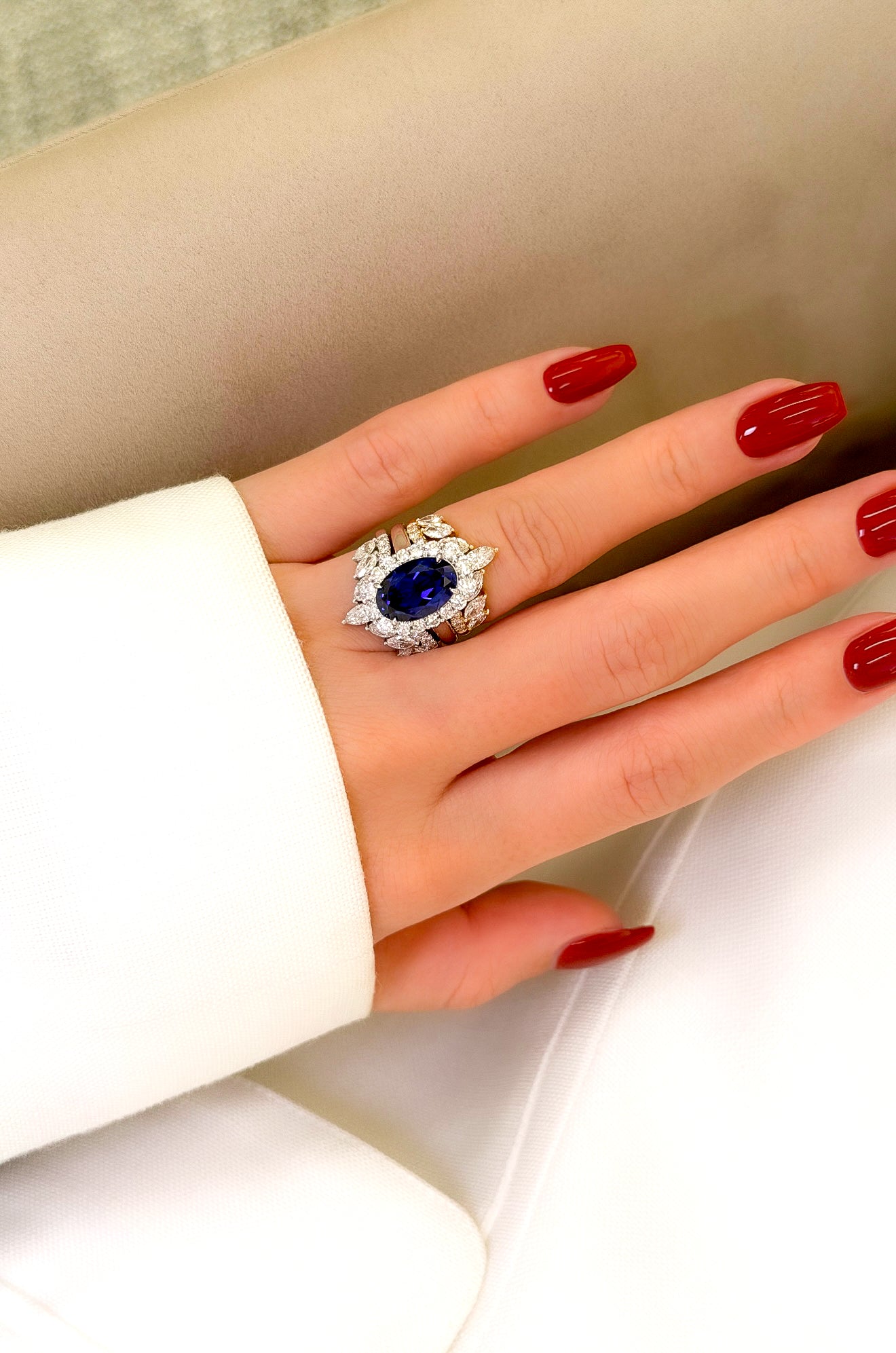 The Gloria, 4ct Elongated Oval-cut Blue Sapphire Halo Cathedral Ring by Earthena Jewelry of Beverly Hills handcrafted in Los Angeles, California.