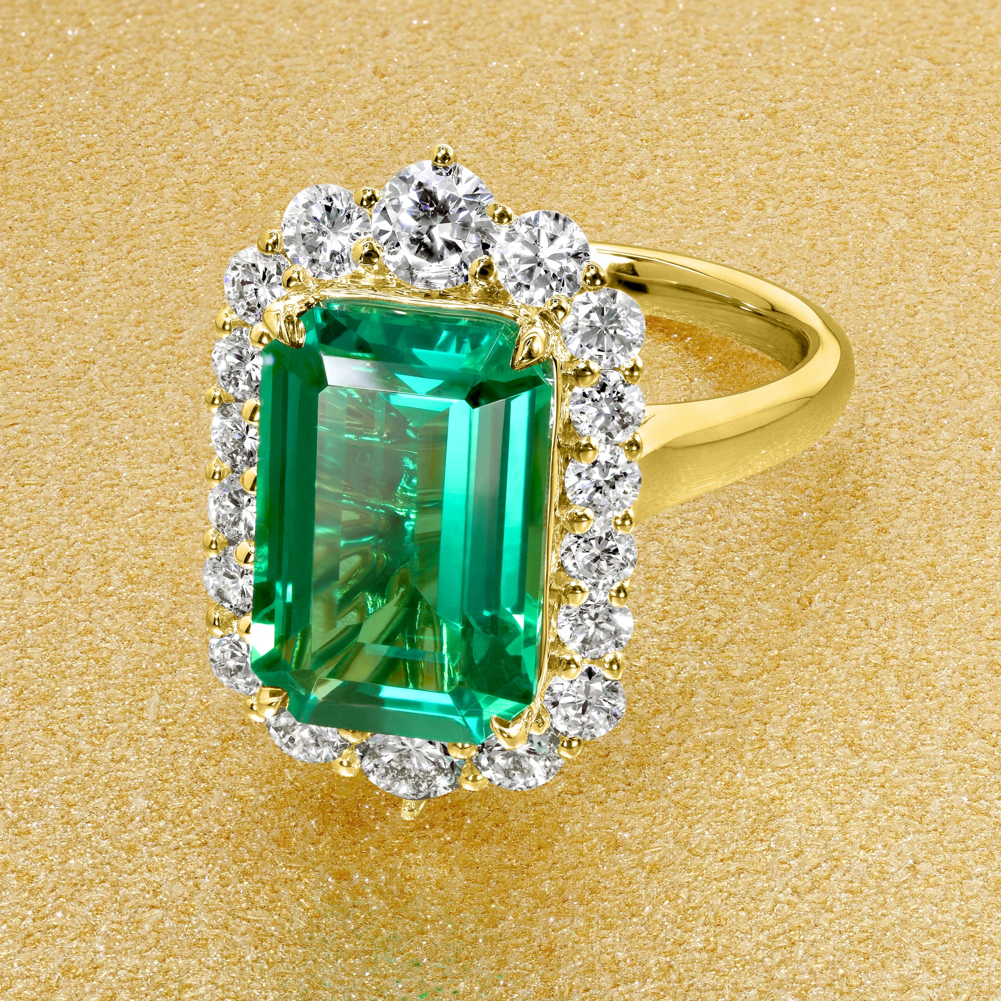 Gloria 3.5ct Emerald-Cut Lab-Grown Colombian Green Emerald Halo Cathedral Engagement Ring in 14K Gold, 18K Gold, or Platinum by Earthena Jewelry of Beverly Hills.
