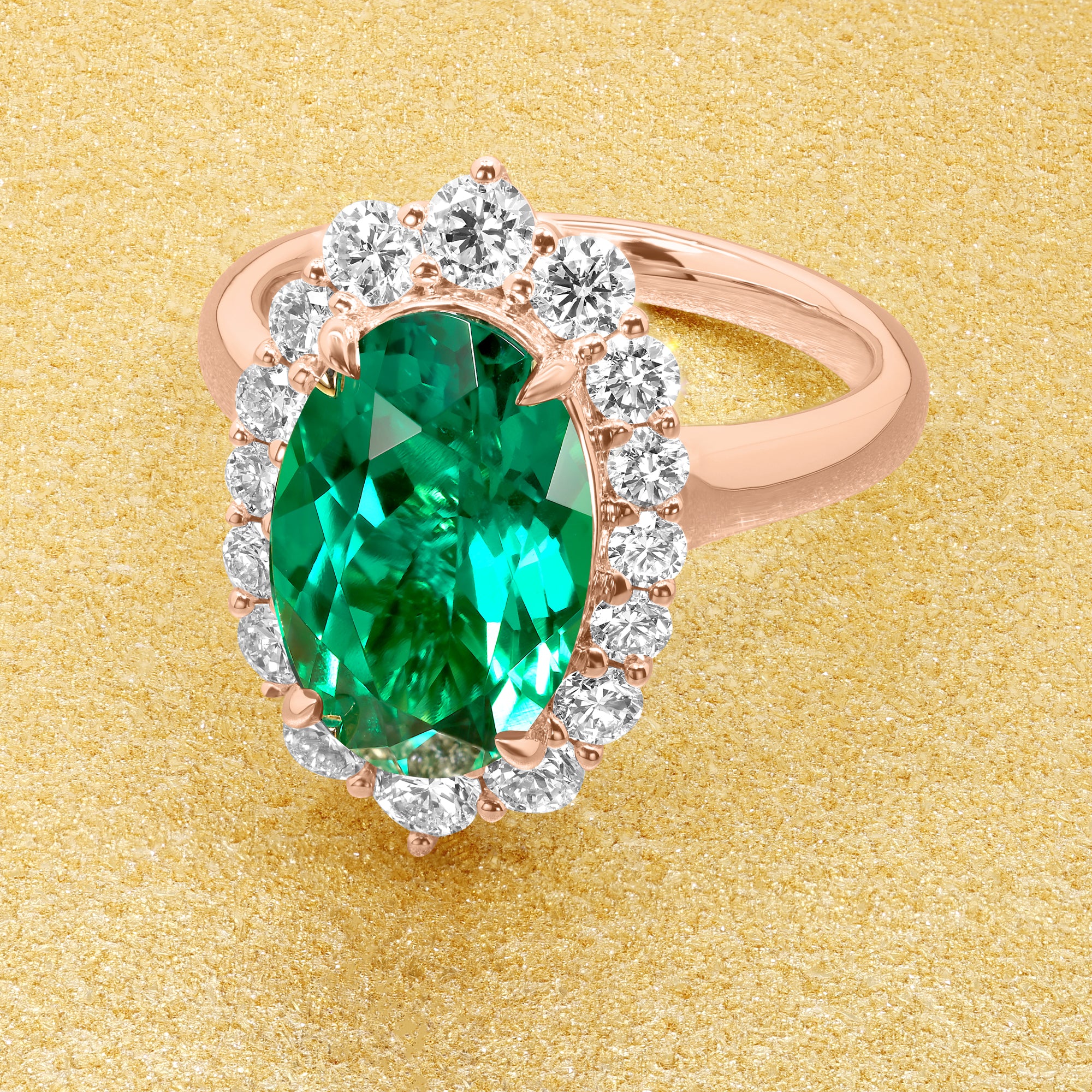 Gloria 3ct Elongated Lab-grown Oval-cut Vivid Green Emerald Halo Cathedral Engagement Ring in 14K Gold, 18K Gold, or Platinum by Earthena Jewelry of Beverly Hills.